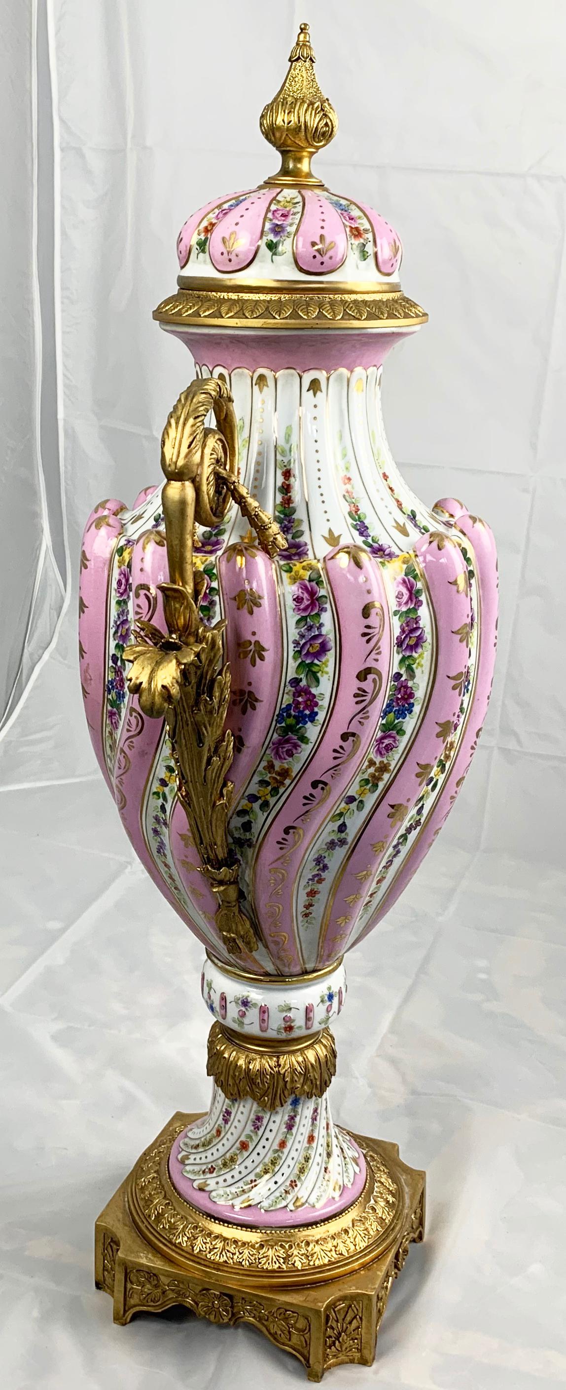 20th Century Pair of Ormolu Mounted Pink Sevres Vases with Lids For Sale 12