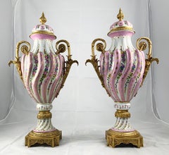20th Century Pair of Ormolu Mounted Pink Sevres Vases with Lids