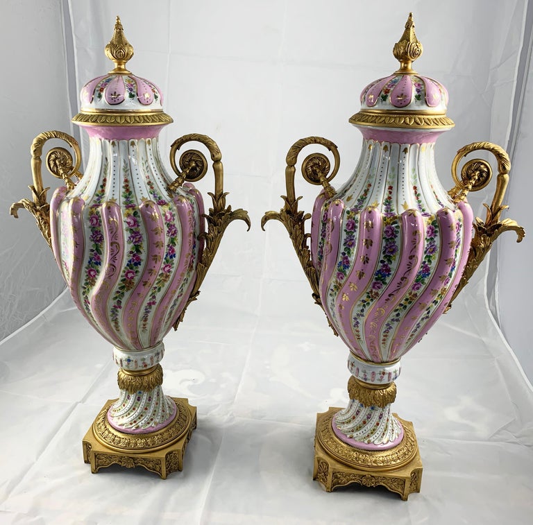 20th Century Pair of Ormolu Mounted Pink Sevres Vases with Lids For