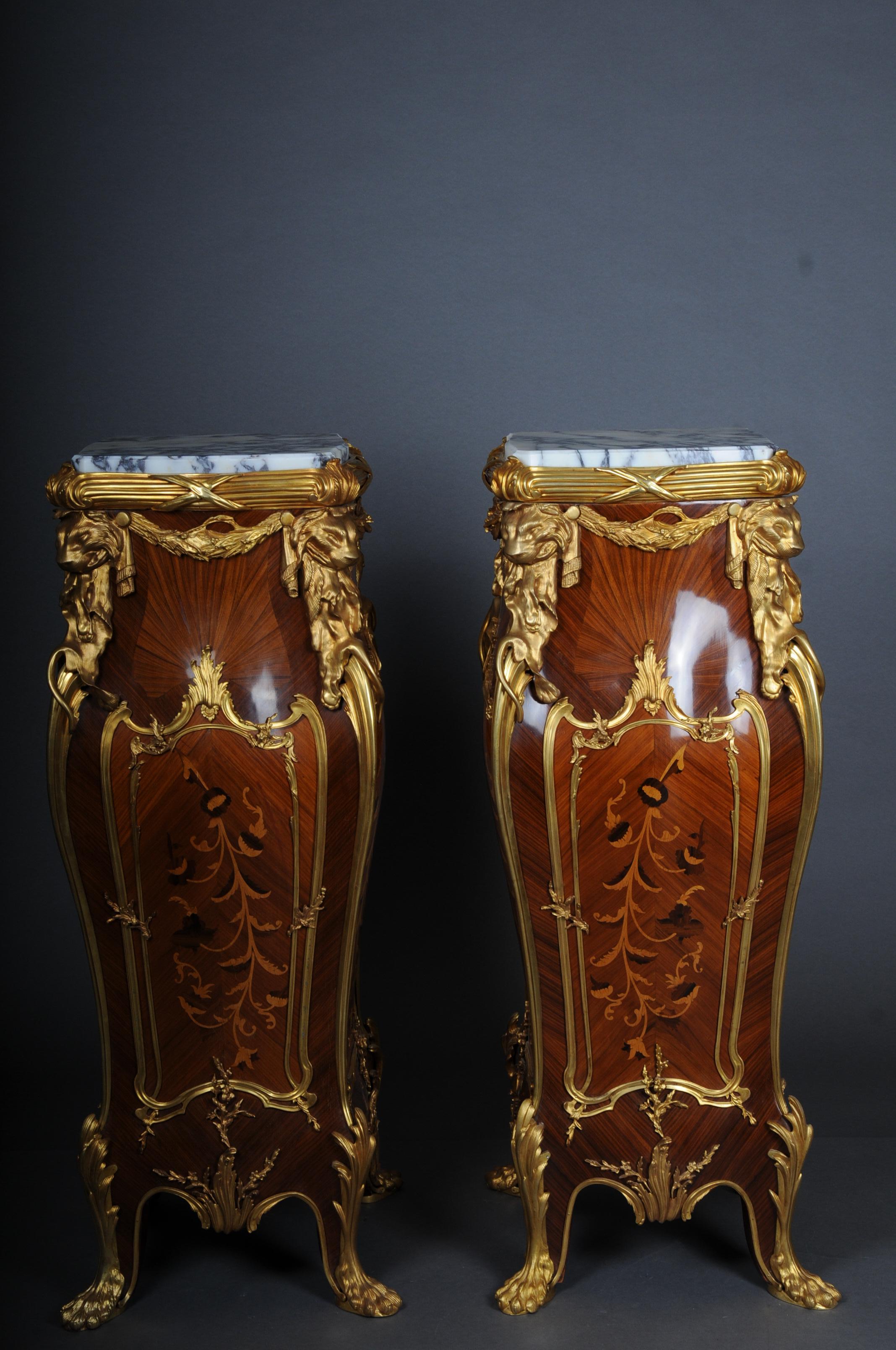 20th Century pair of ormolu pedestals/column after François Linke, bronze valid.

Solid beech wood, cambered body with rich and high quality marquetry/inlaid veneer work. High-quality gilded bronze with fine chasing. Very high-quality processed