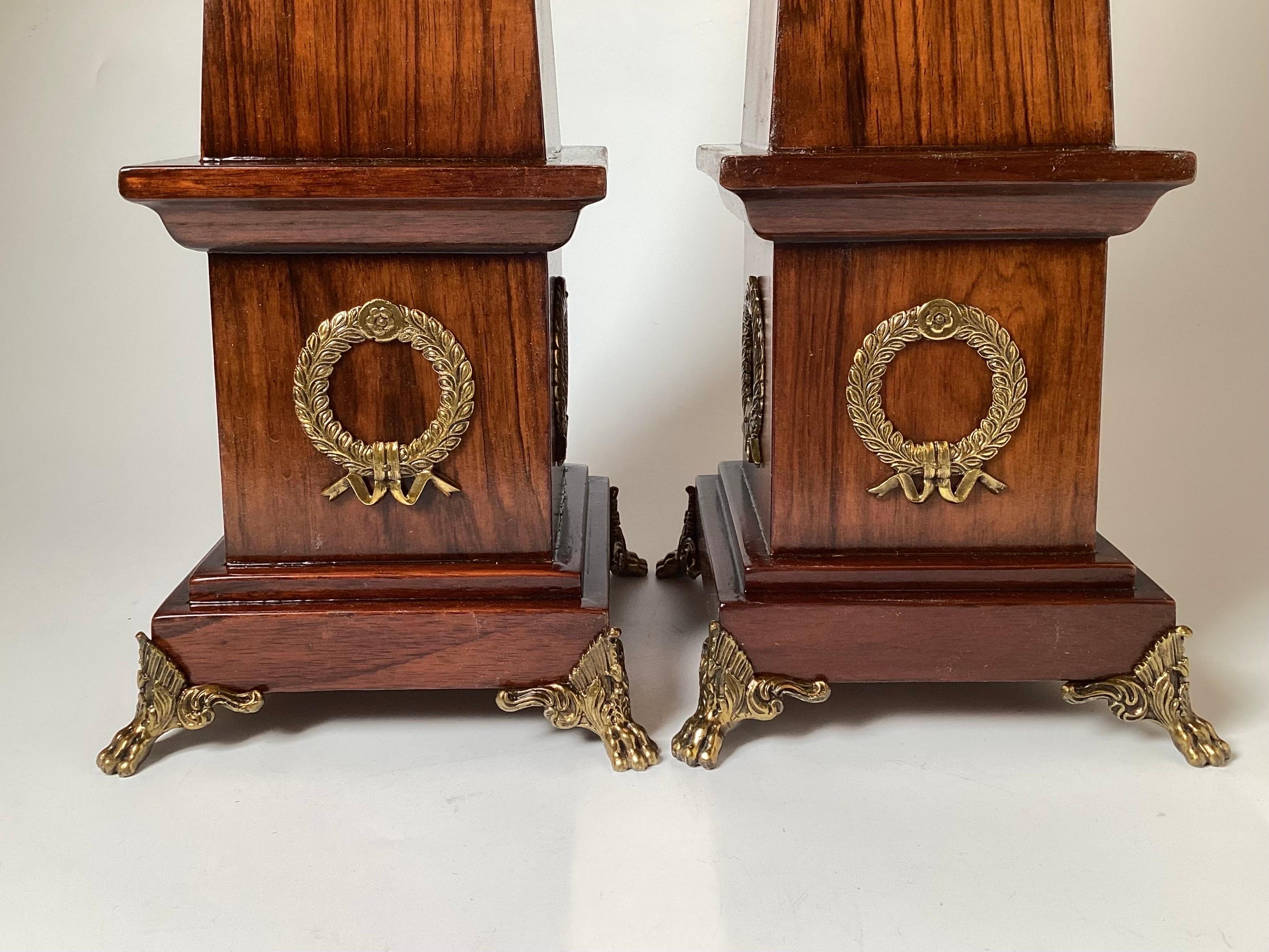 Neoclassical 20th Century Pair of Rosewood Obelisks with Decorative Brass Mounts and Feet