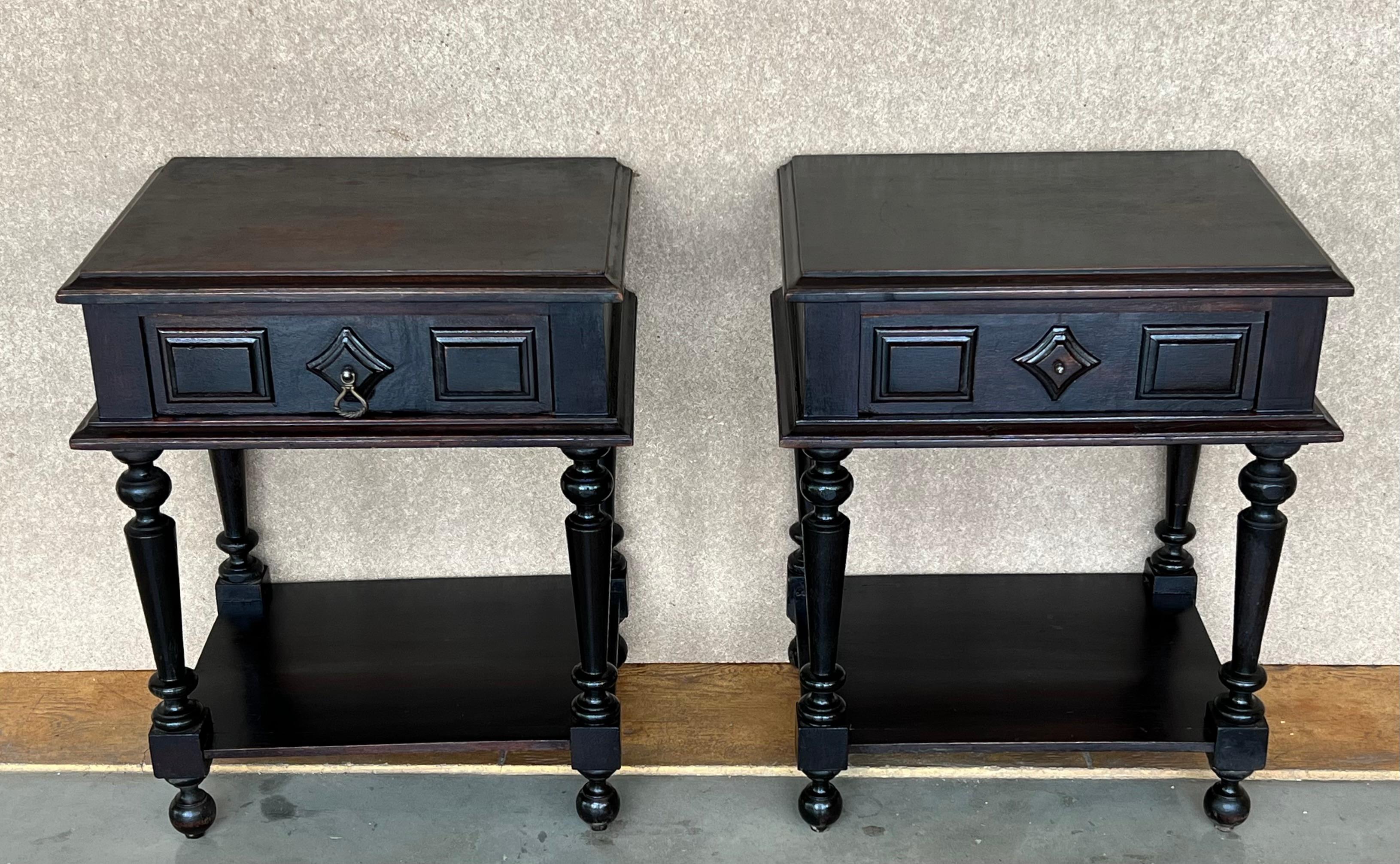 20th century pair of solid carved French nightstands with Turned columns and Low shelve.
It has one carved drawer with original bronze pull.