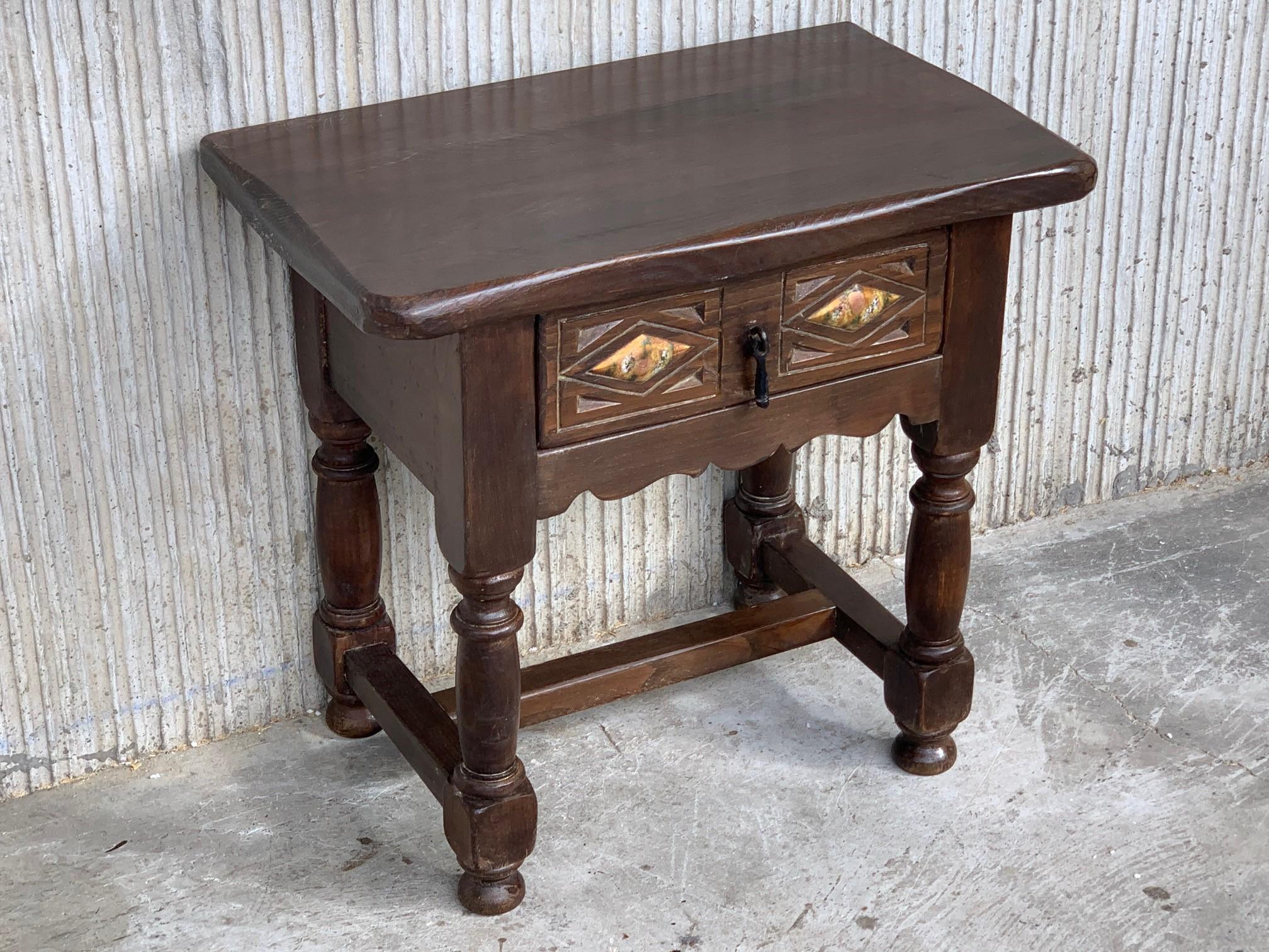 20th century pair of Spanish nightstands with drawer and iron hardware.
Beautiful tables that you can use like a nightstands or side tables, end tables, or table lamp.
