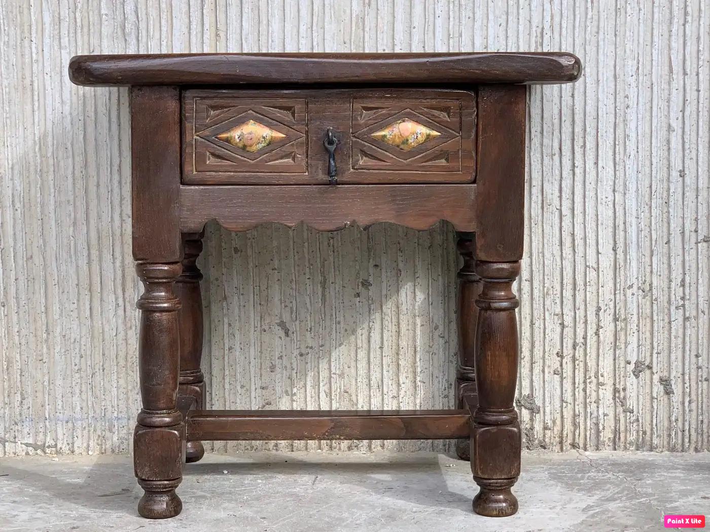 20th century pair of Spanish nightstands with drawer and iron hardware.
Beautiful tables that you can use like a nightstands or side tables, end tables, or table lamp.