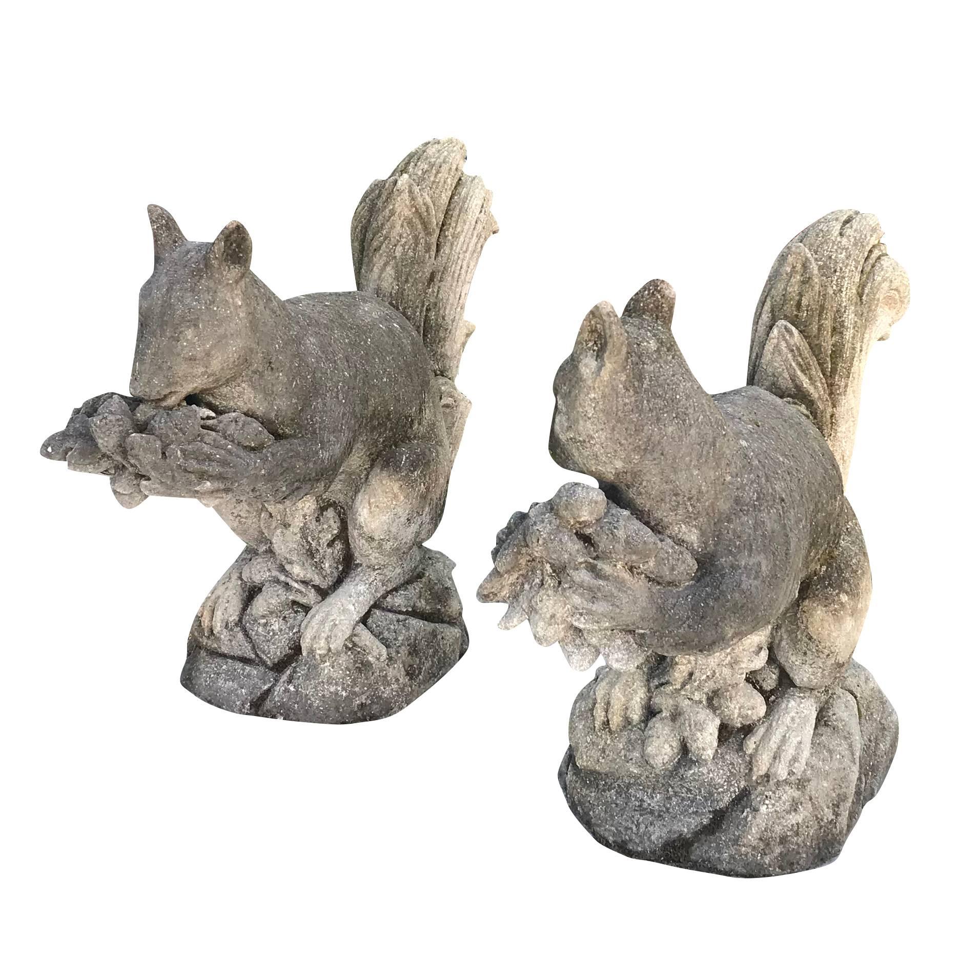 A detailed of a pair of squirrels facing in different directions and eating, circa 1960. Carving in Limestone carved by hand in Italian limestone.