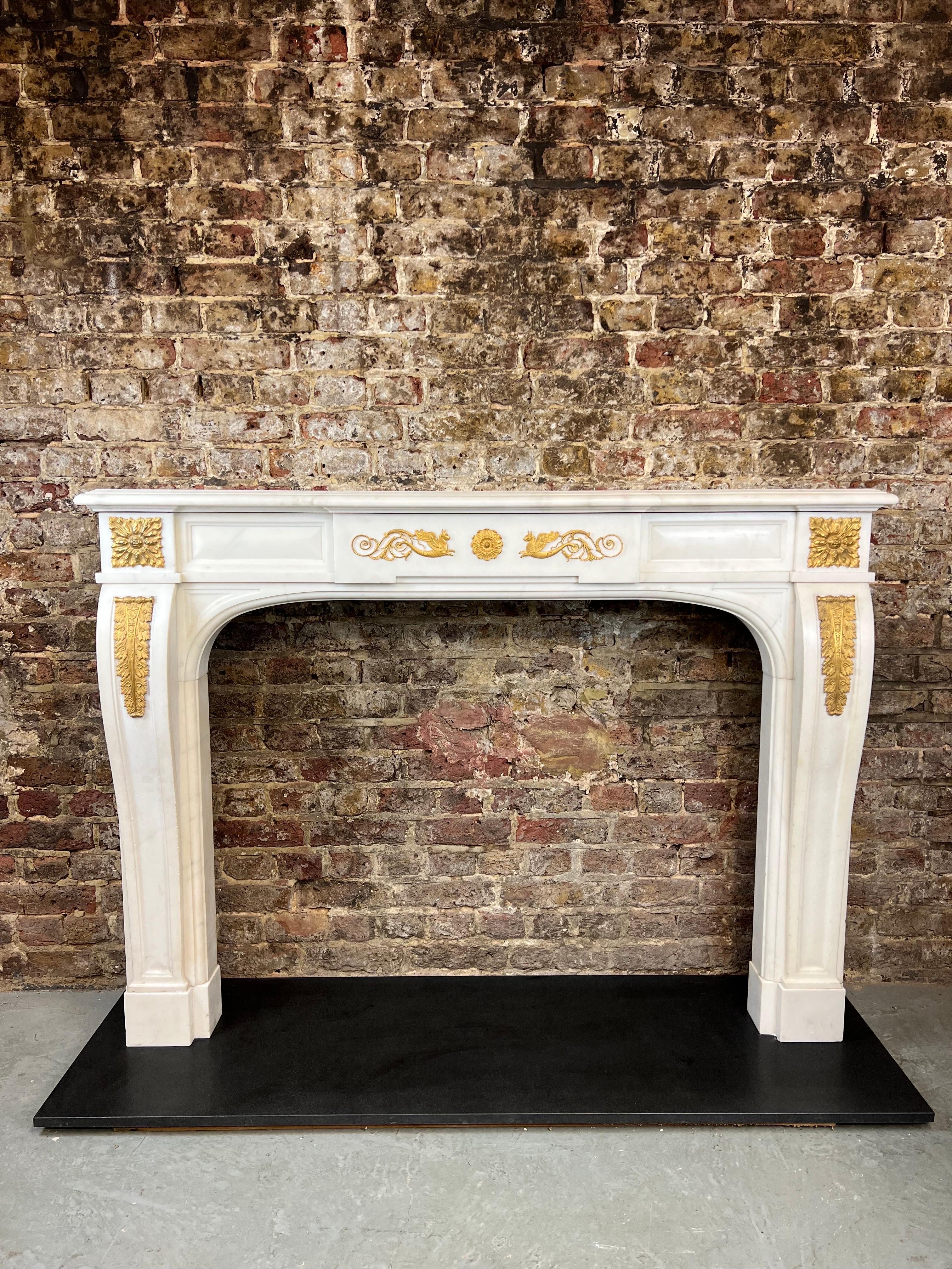 20th Century pair of statuary marble & ormolu fireplaces.
Early 20th Century (Late Victorian) Pair of White Statuary Marble Chimneypieces, 
With Fine Ormolu Mounts To The Upright Jambs And Central Frieze & Tablets.
Recently Salvaged From A