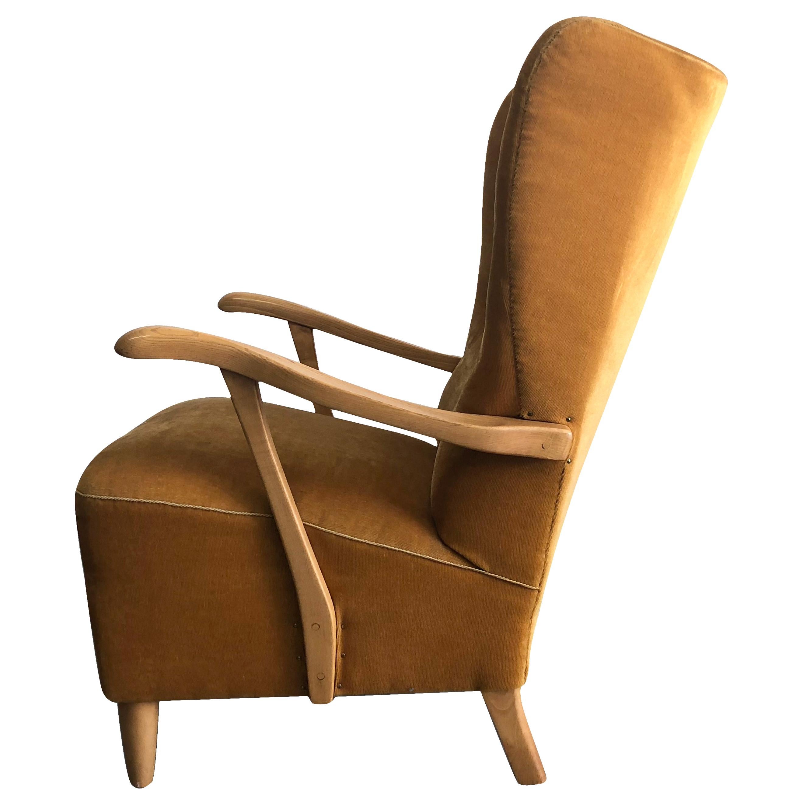A pair of 1950s ear shaped Swedish Wingback lounge chairs in very good condition with original upholstery and Birchwood, in the style of Carl Malmsten.

Seat 18” H x 19.5” D.