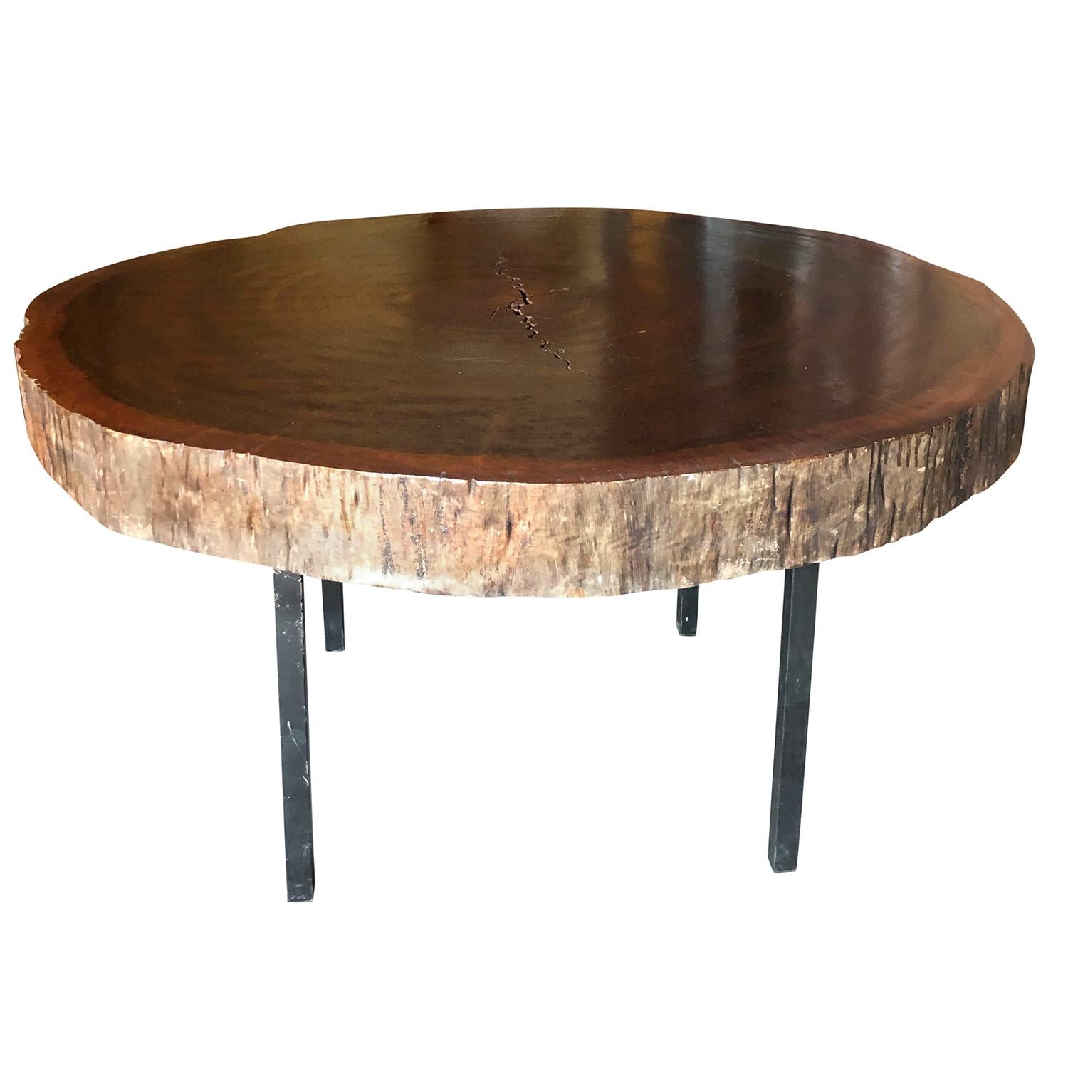 A dark-brown, vintage Mid-Century Modern French pair of low tree trunk tables made of hand carved Oakwood on very simple metal legs, in the style of George Nelson. The side, coffee tables are in good condition. Wear consistent with age and