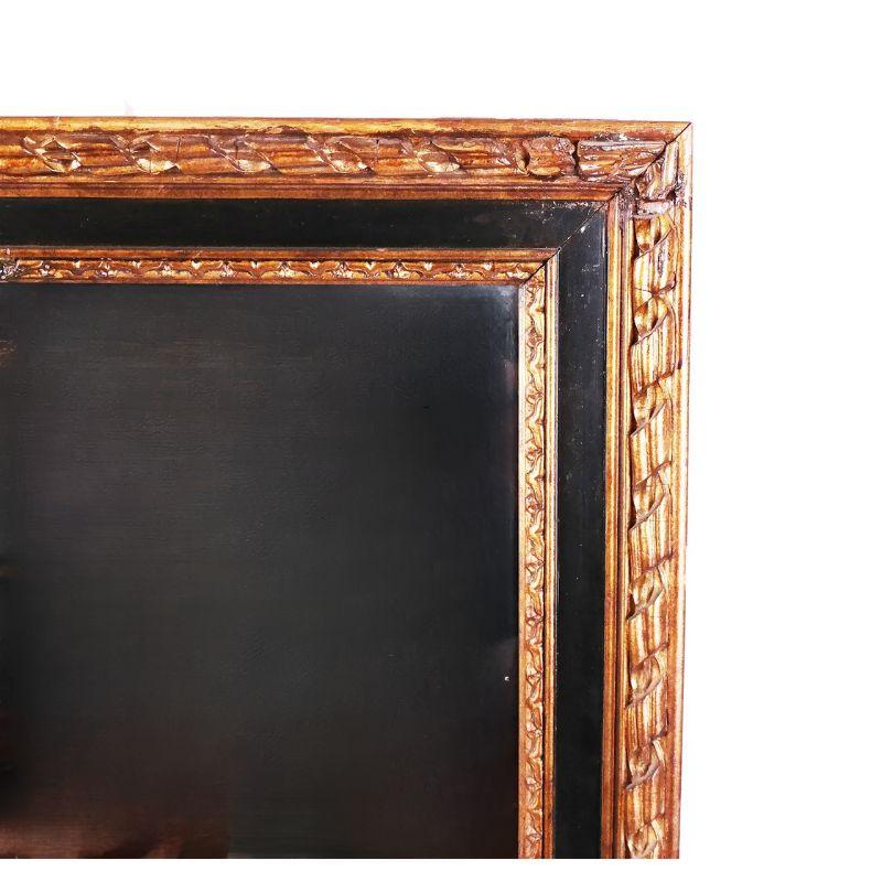 20th Century Parcel Giltwood and Ebonized Mirror In Good Condition For Sale In Locust Valley, NY