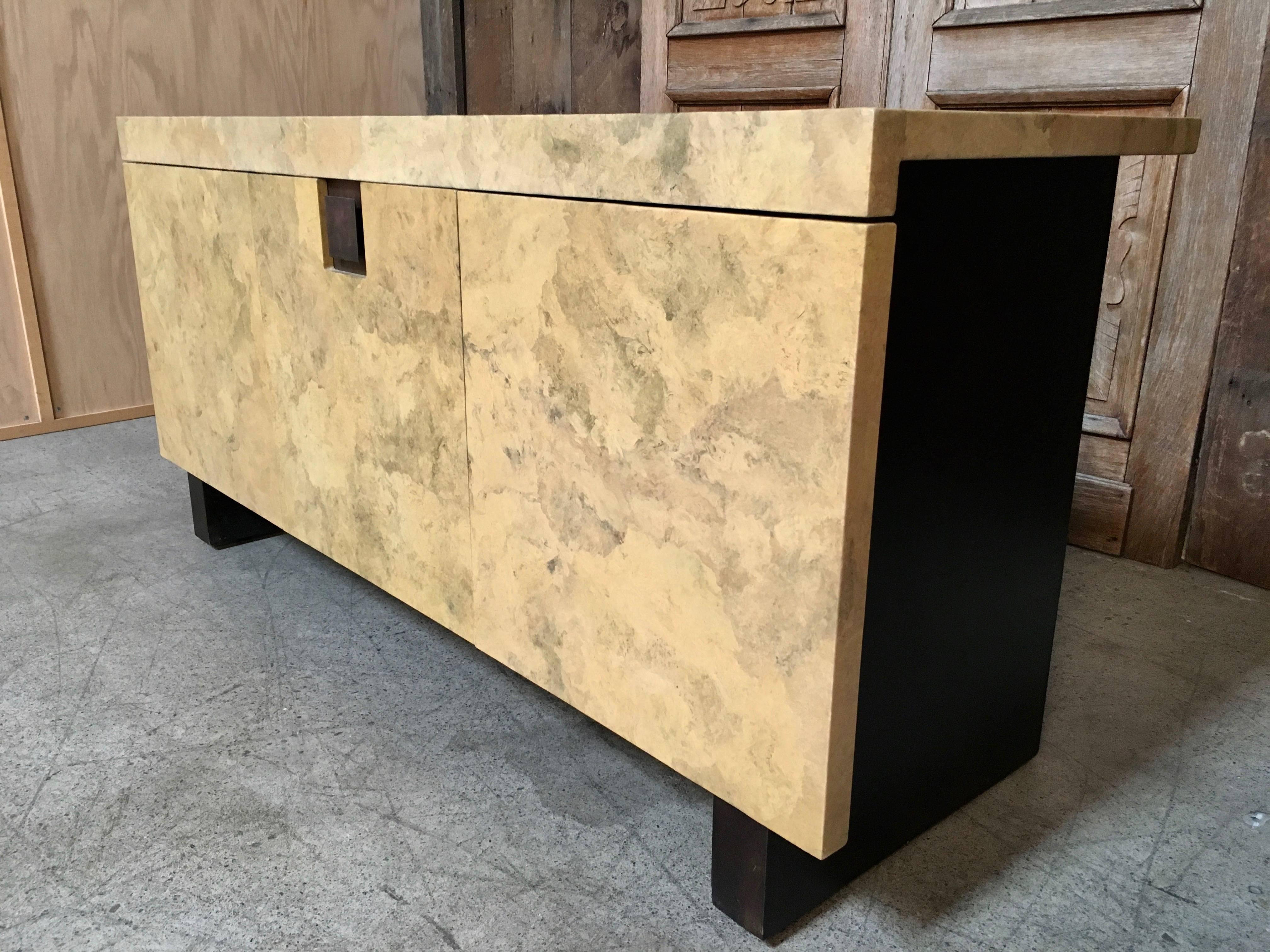 Nice three-door parchment paper covered credenza solid wood construction.