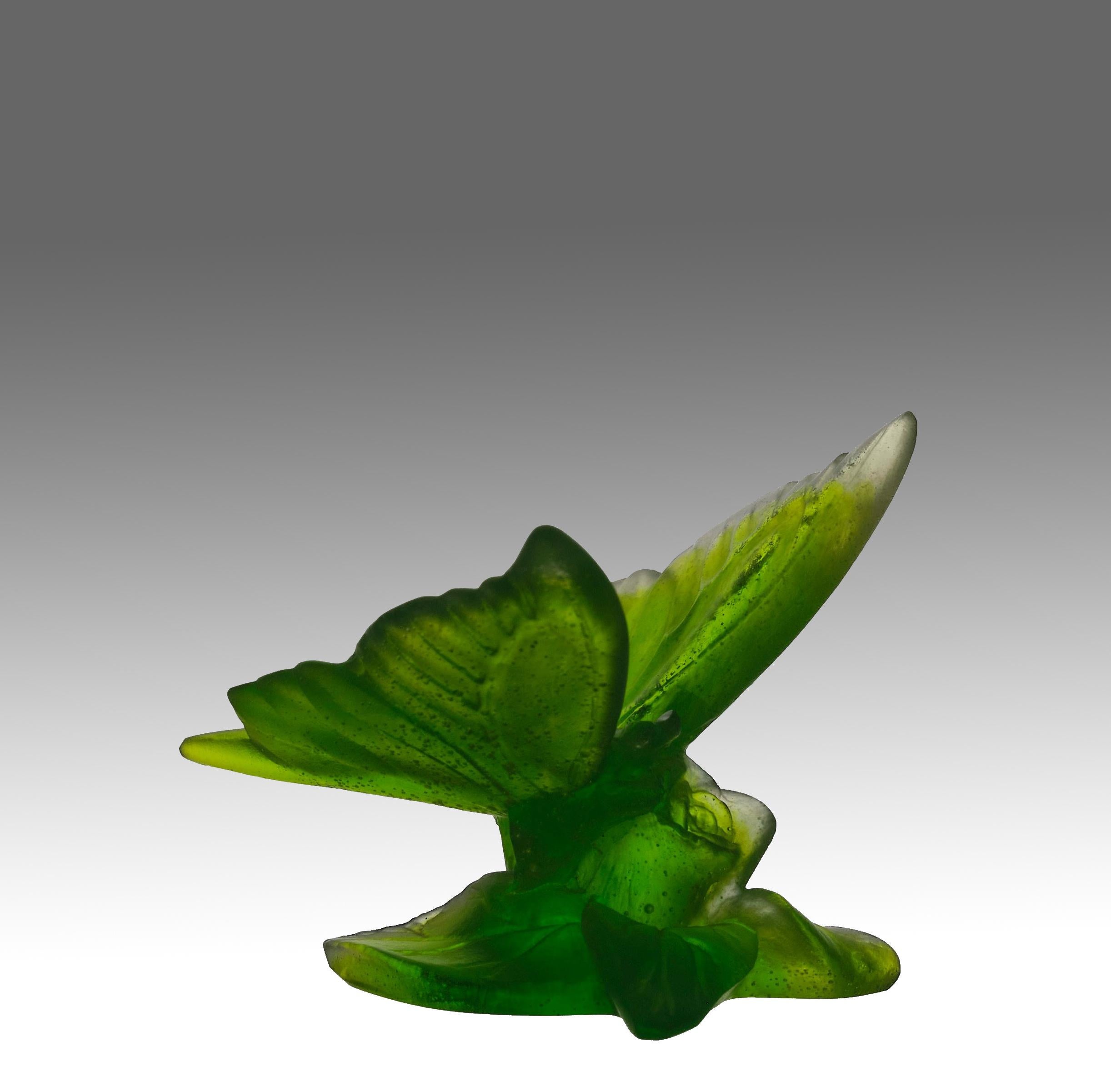 An attractive mid 20th Century pate de verre glass study of butterfly rested on a rose with excellent detail and very fine vibrant colour, signed Daum France

ADDITIONAL INFORMATION
Height:                                      7 cm

Width:          