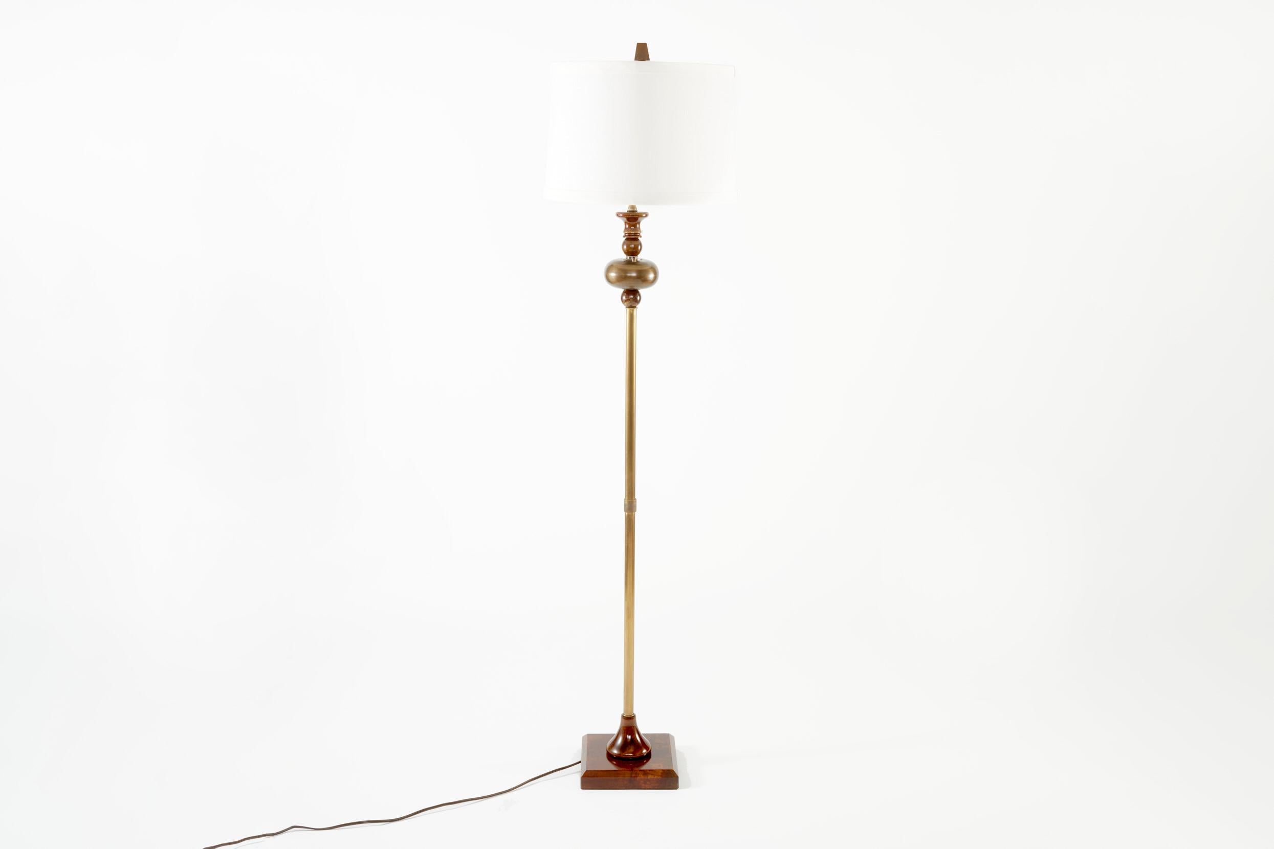 Beautiful 20th century solid patinated bronze with square marble base floor lamp with round linen exterior / silk interior shade . The lamp is in good working condition . Recently rewired . No special light bulb required . The lamp stands about 67.5