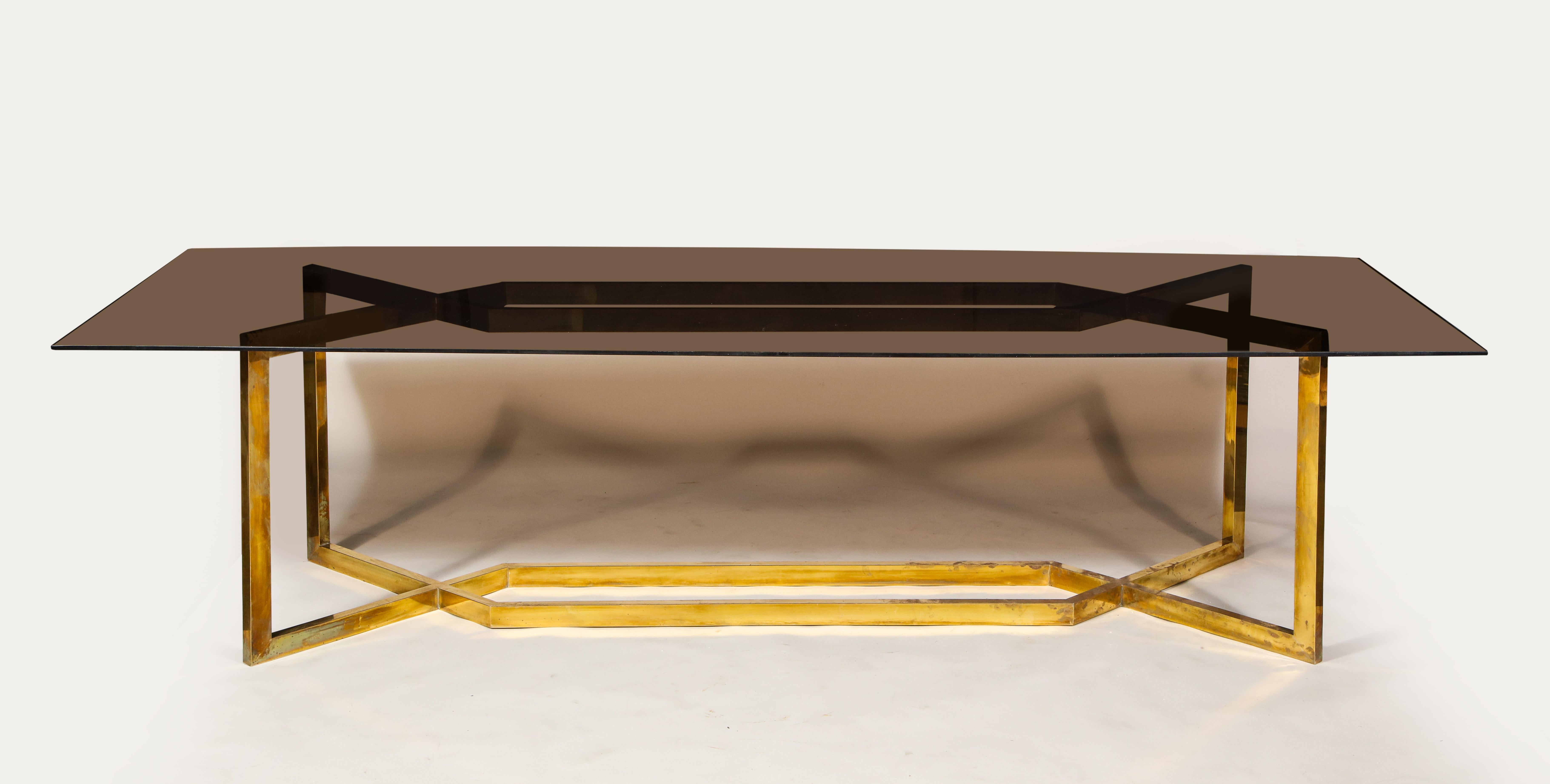 20th century Paul Legeard brass dining table smoked glass top, Italy, 1970

Beautiful Paul Legeard large dining or conference table. Architectural base shape. Shown here with smoked glass. Incredible large scale piece. Imported from France