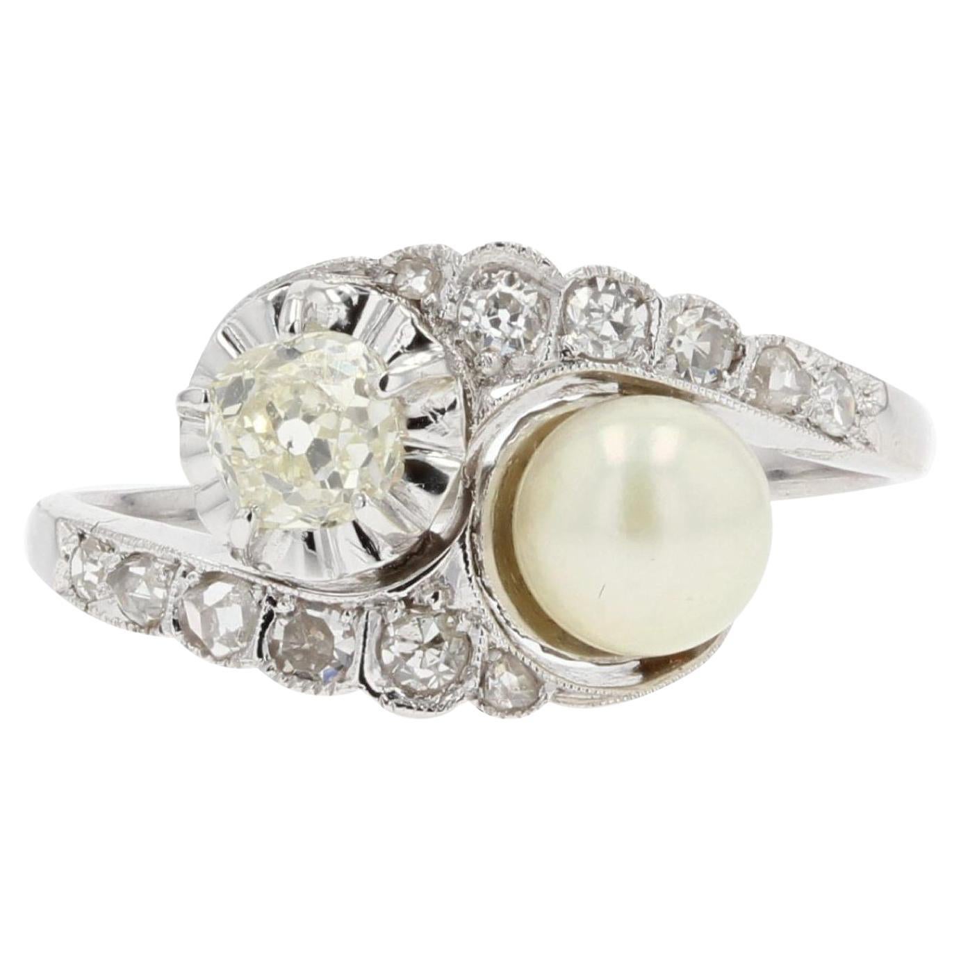 Sie und ich, Ring aus 18 Karat Weißgold mit Perlen und Diamanten, 20. Jahrhundert