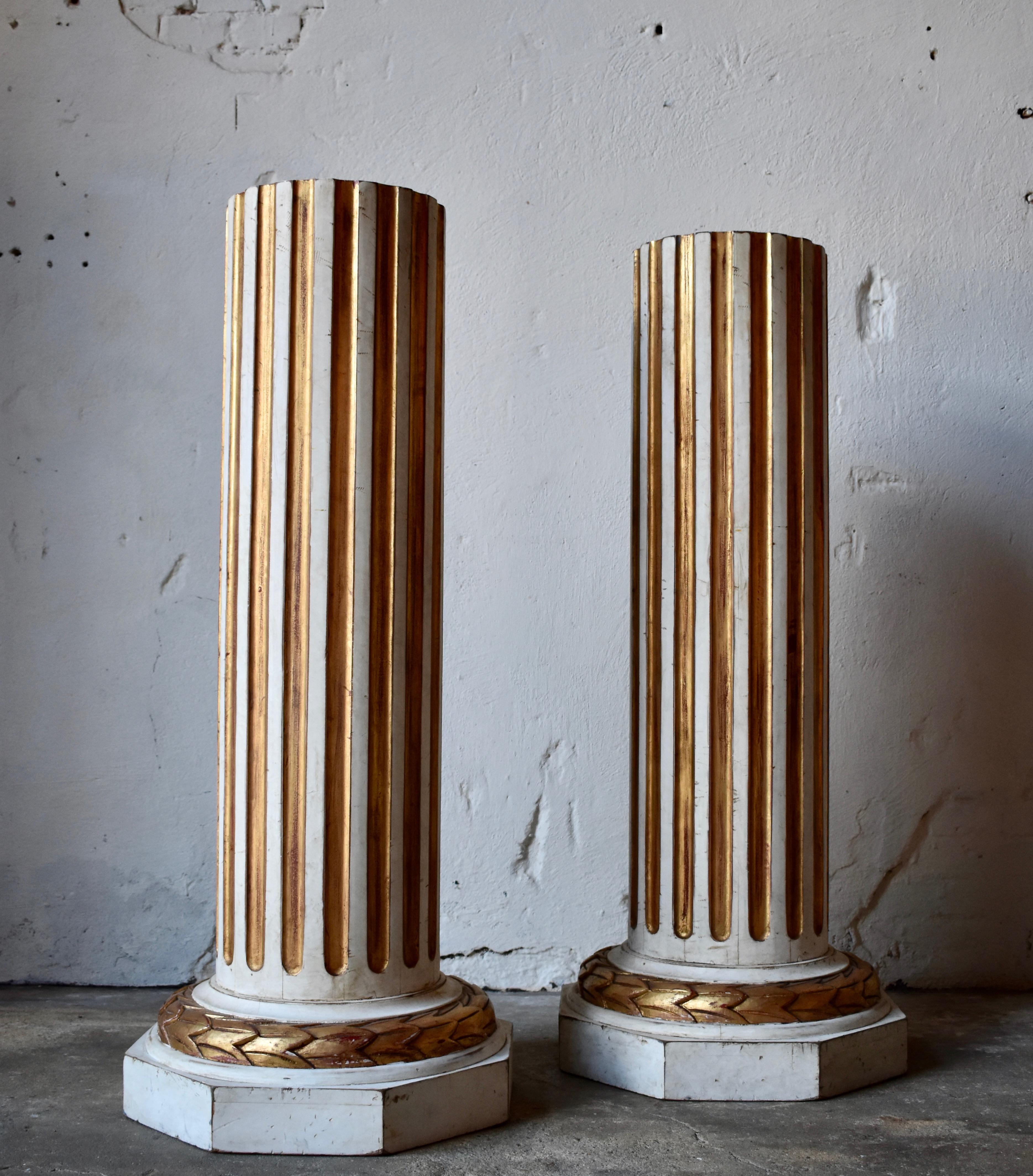 20th century pedestals in Gustavian Style
Painted and giltwood details.

Early to mid-20th century 
beautiful patina.