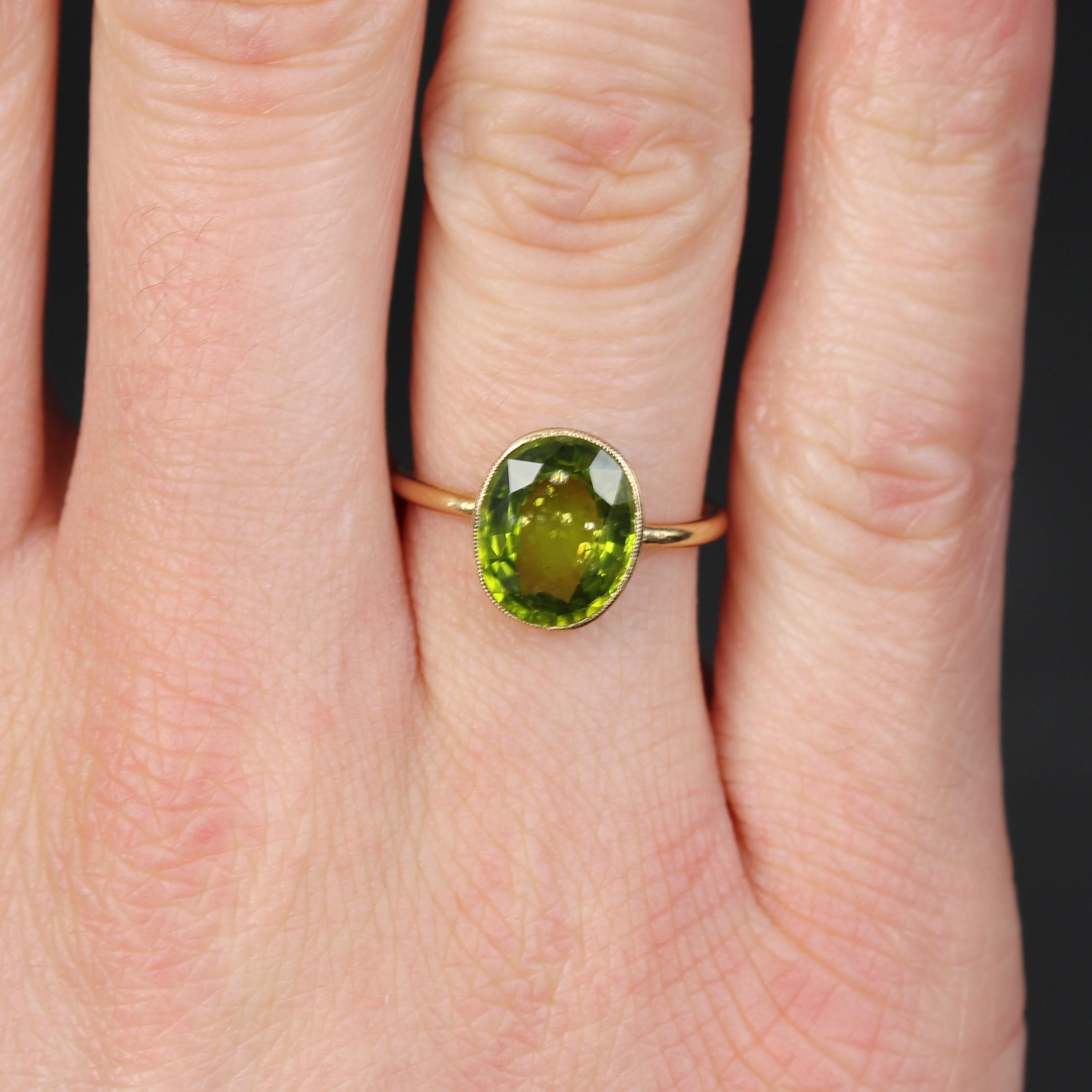 Women's 20th Century Peridot 18 Karat Yellow Gold Solitaire Ring For Sale