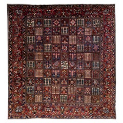 Tapis persan Bakhtiari du 20ème siècle en laine rouge entièrement réalisé à la main