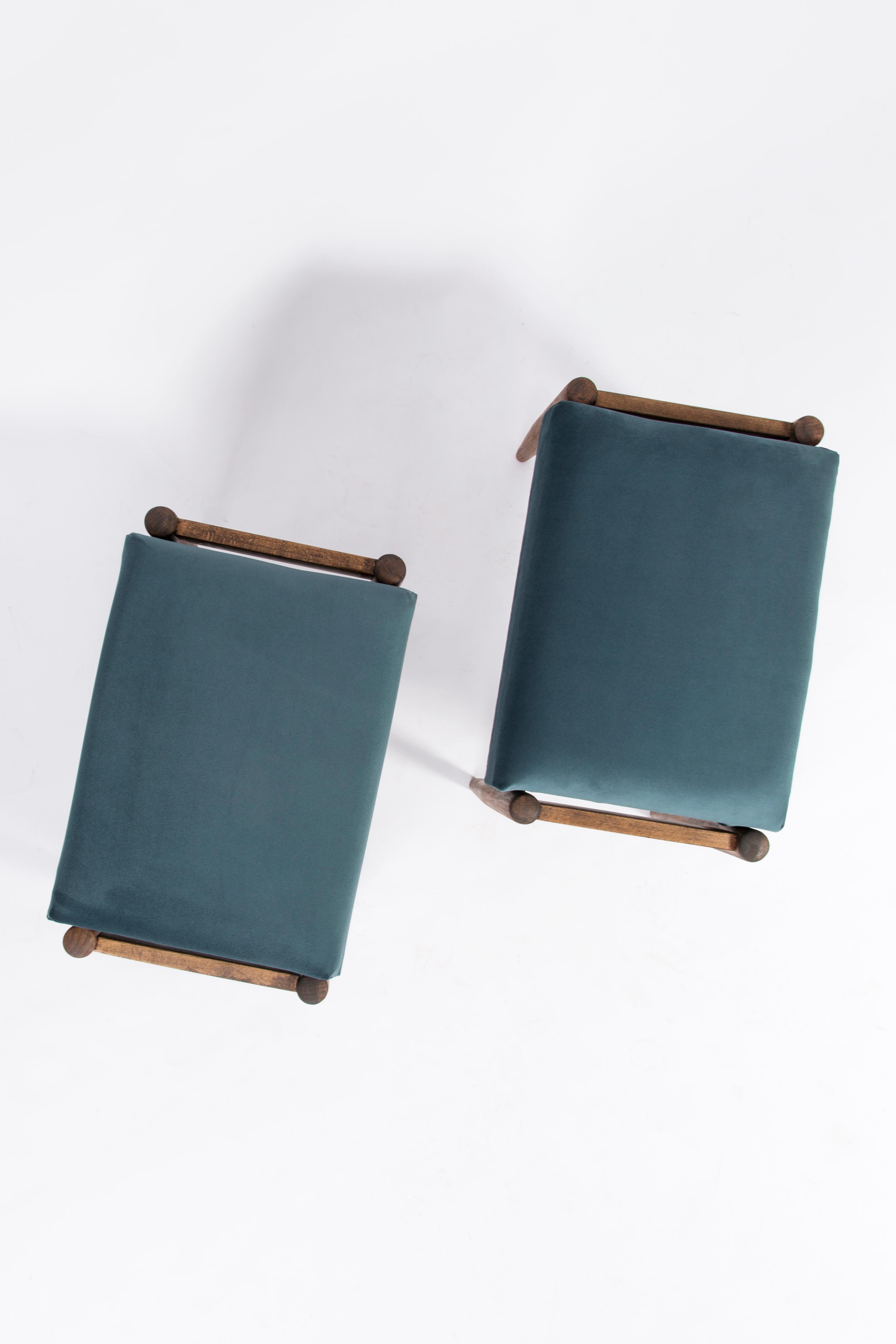 Stool from the turn of the 1960s. Beautiful petrol blue high quality velvet upholstery (color number 14). The stool consists of an upholstered part, a seat and wooden legs narrowing downwards, characteristic of the 1960s style. We can prepare this