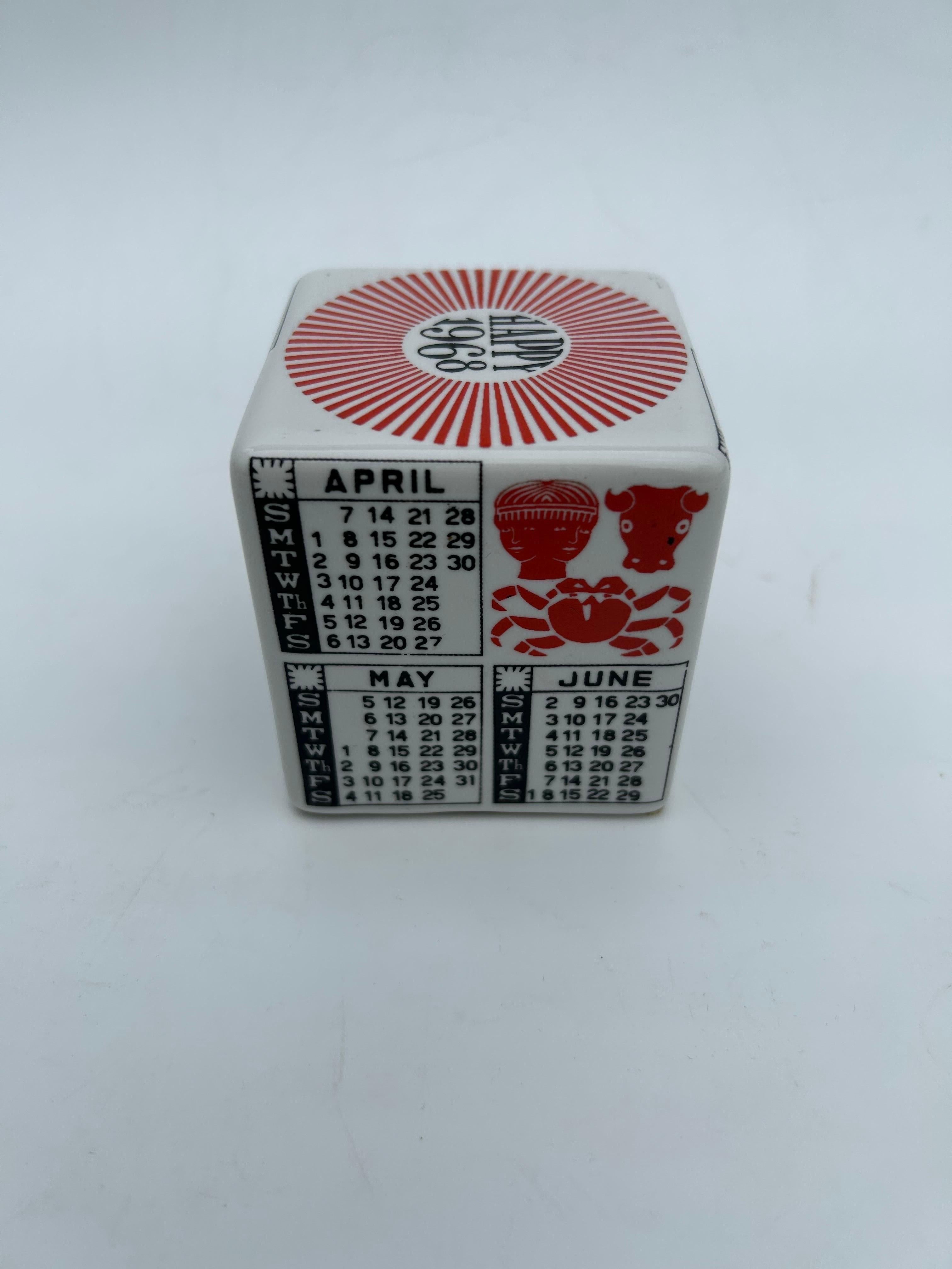 20th century Piero Fornasetti Milano Paperweight Calendar Happy 1968 
A rare Fornasetti porcelain paperweight by Piero Fornasetti Milano 1968. happy 1969, design Piero Fornasetti. This paperweight is a beautiful desk accesesoir, or a nice birthday