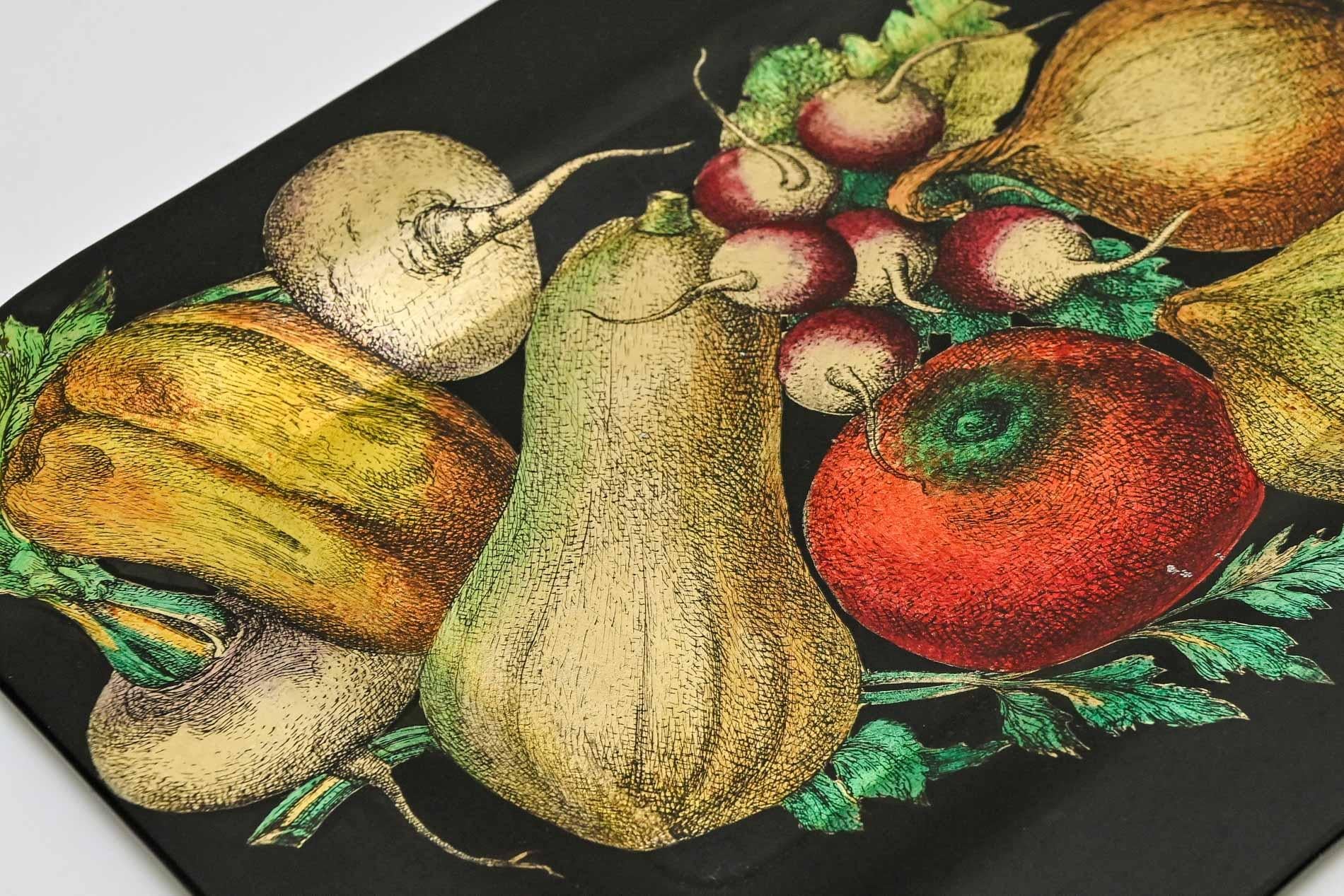 20th century Piero Fornasett Tray, Italy Milano 1955
A particularly rare tray by Piero Fornasetti with vegetables in a special 
chandelier . very good condition slight signs of use and provided with the 
original label.