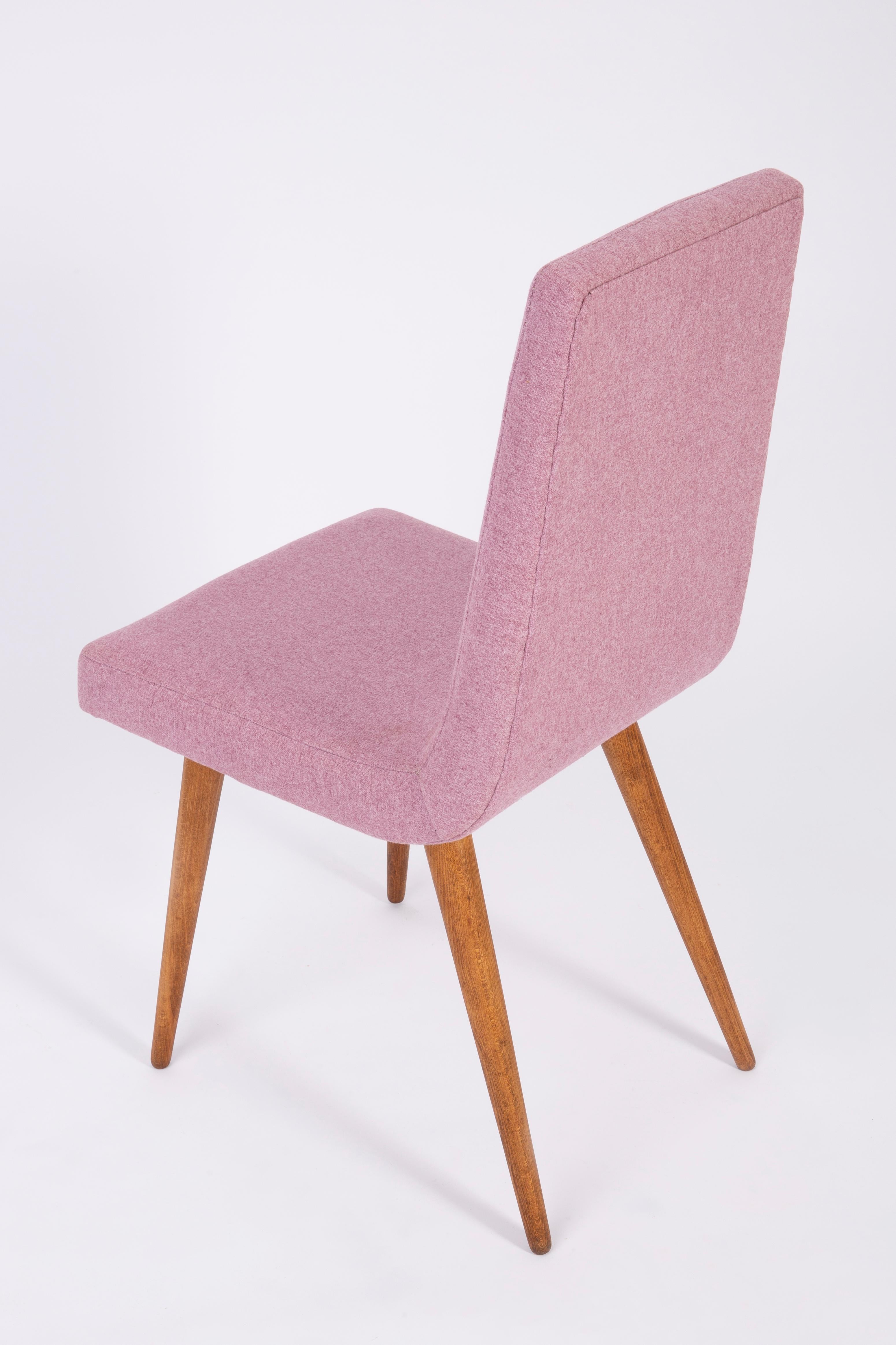 Chair designed by Prof. Rajmund Halas. Have been made of beechwood. The chair is after complete upholstery renovation, the woodwork has been cleaned and refreshed. We used matte varnish. Seat and back was dressed in a pink mélange (color 2807),