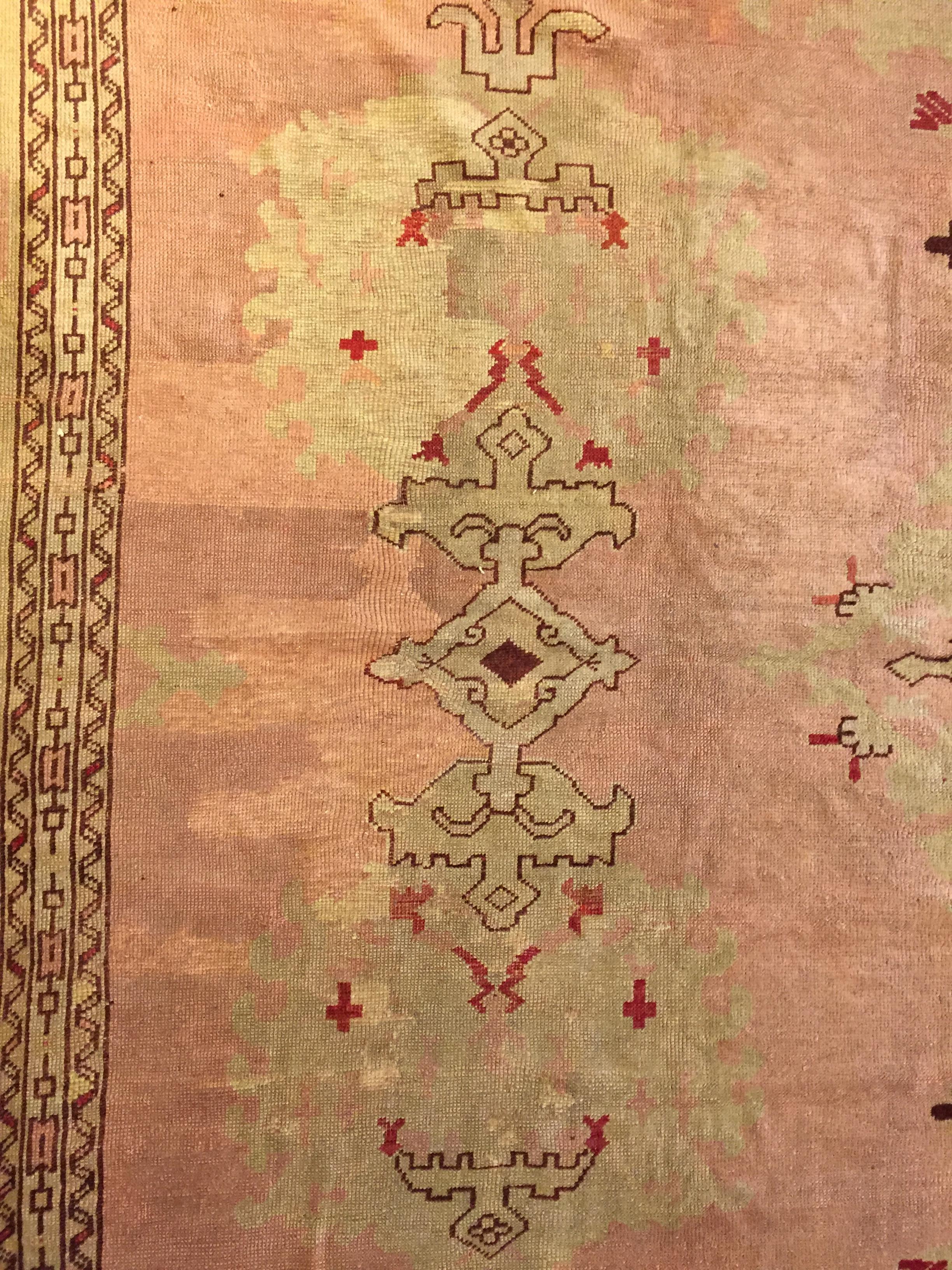 Hand-Knotted 20th Century Pink Wool Turkish Ushak Central Western Anatolia Rug, 1900s