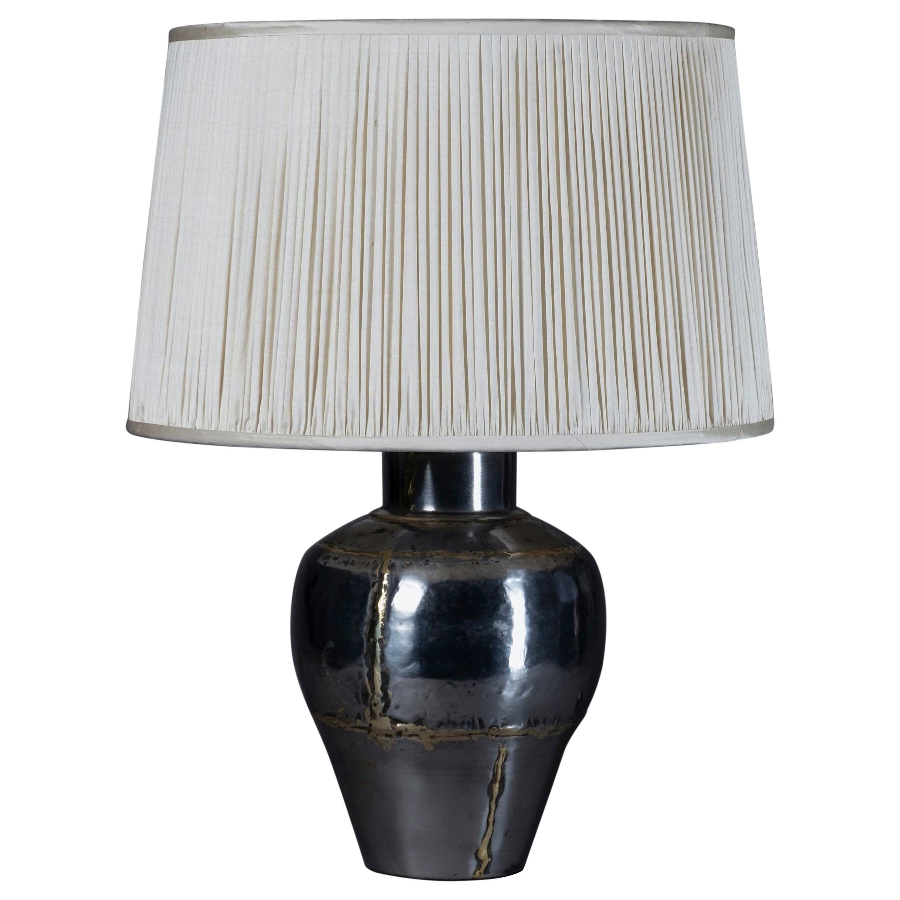 20th Century Polished Steel and Brass Seamed Vase Lamp