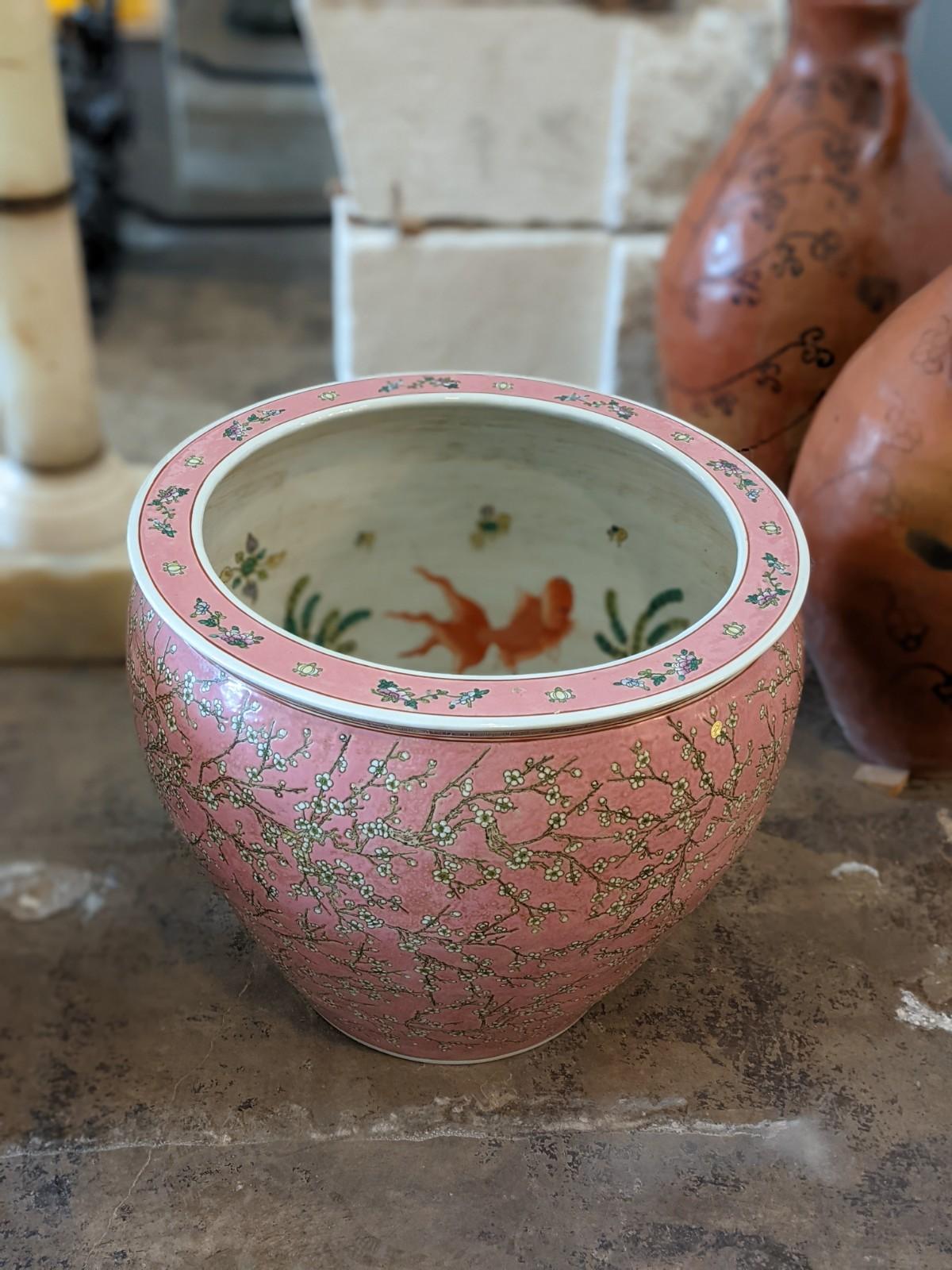 Those Porcelain fish bowls origins from China, circa 1970.
 
