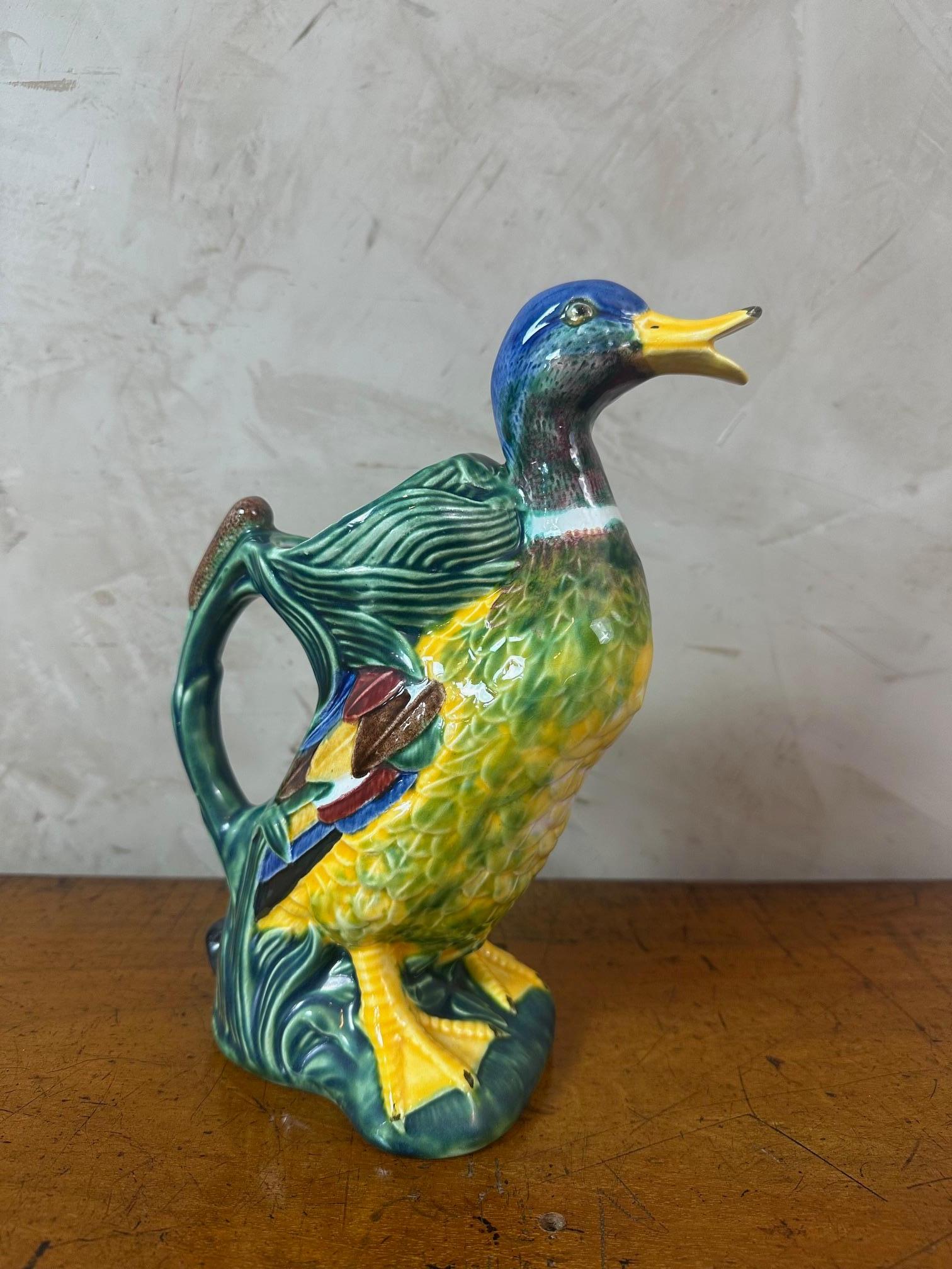 A beautiful Barbotine pitcher depicting a duck, hand-painted in the 1970s.
Signed Mendes Caldas Portugal 335 on the base. Very good condition. Beautiful colors.
