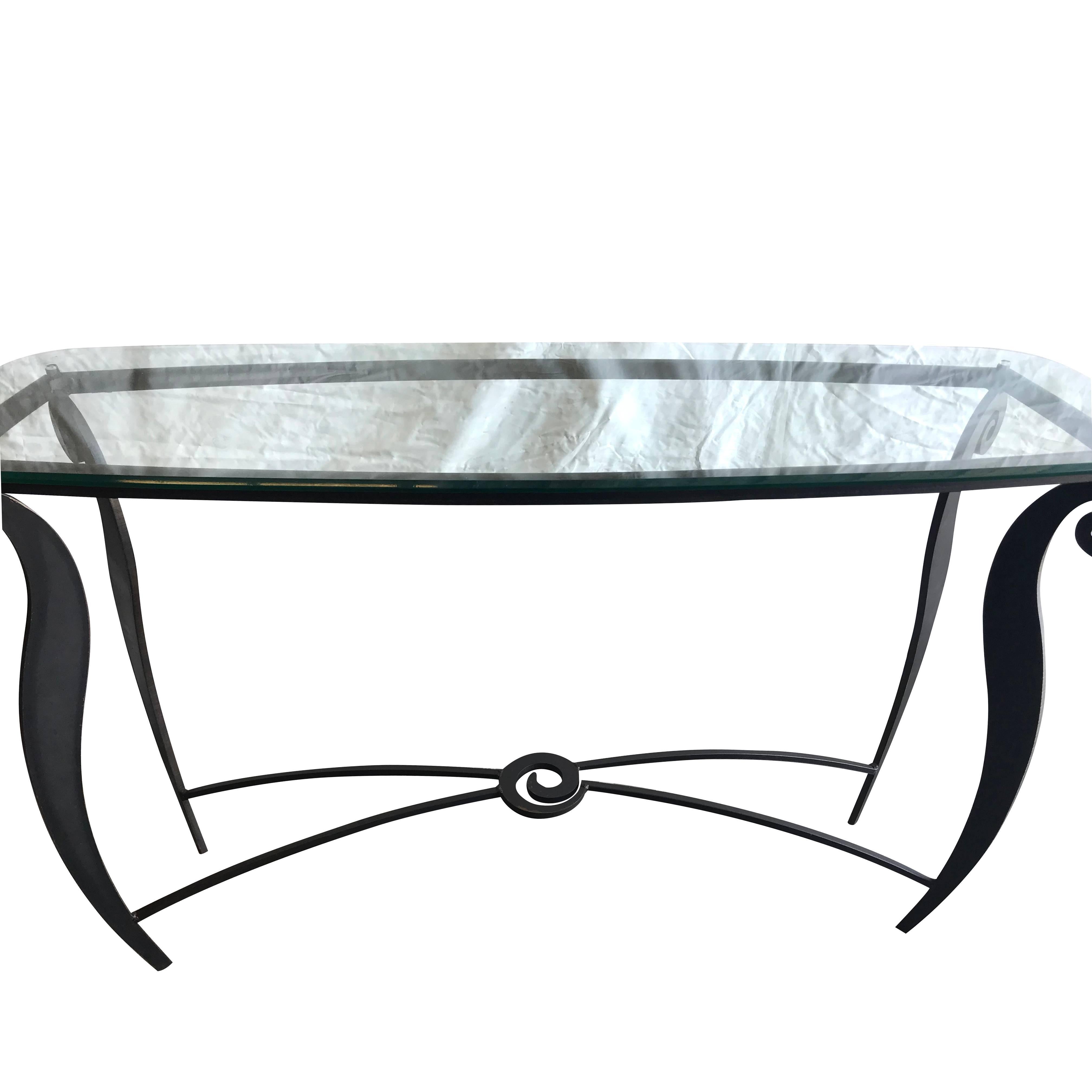 A vintage Mid-Century Modern Italian Pucci De Rossi freestanding console table with metal base and glass top, in good condition. Wear consistent with age and use, circa 1970 - 1980, Italy.

Pucci De Rossi was an Italian designer, artist and