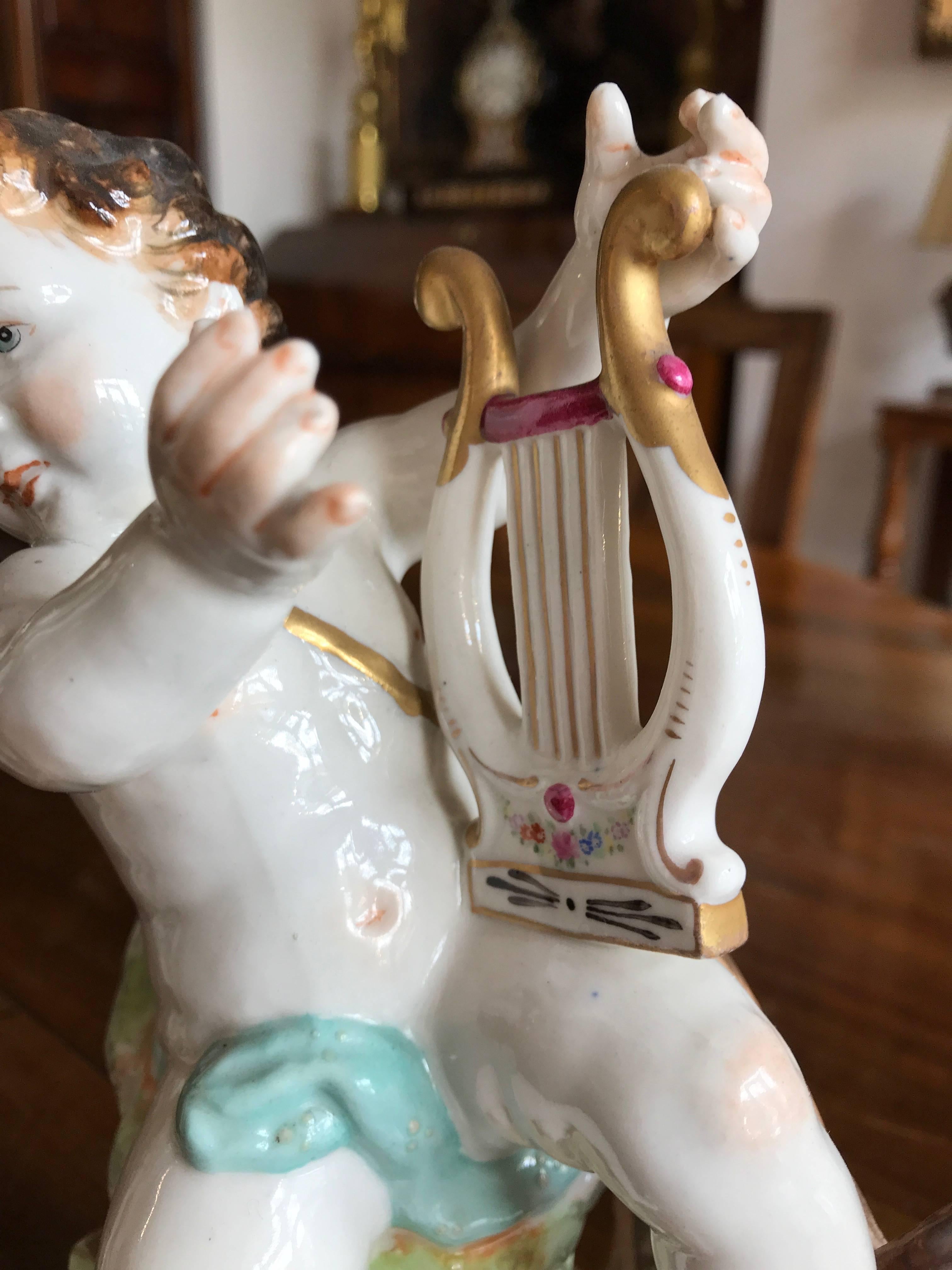 20th Century Putti European Pair of Porcelain Cherubs For Sale at 1stDibs