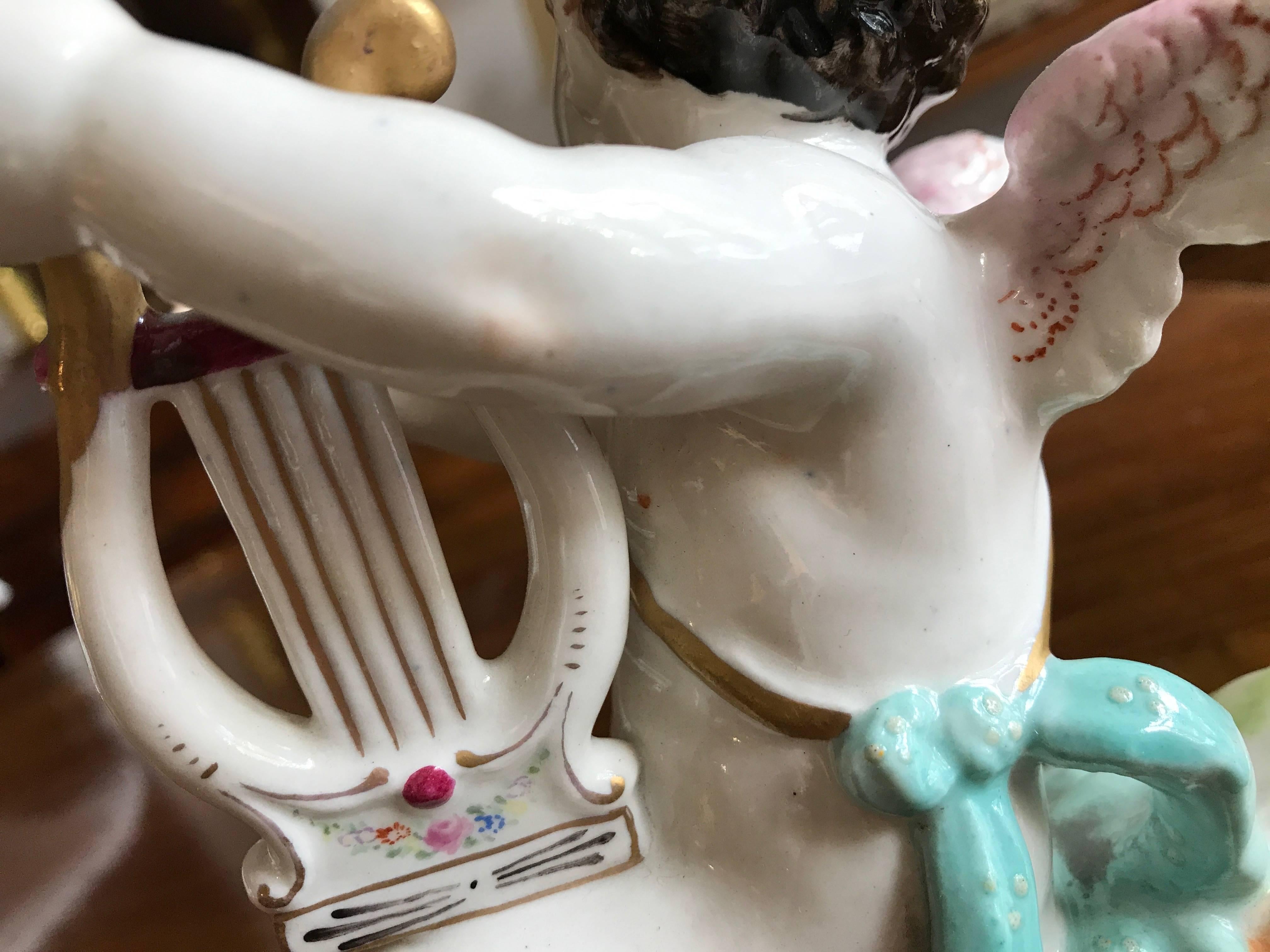 20th Century Putti European Pair of Porcelain Cherubs For Sale at 1stDibs