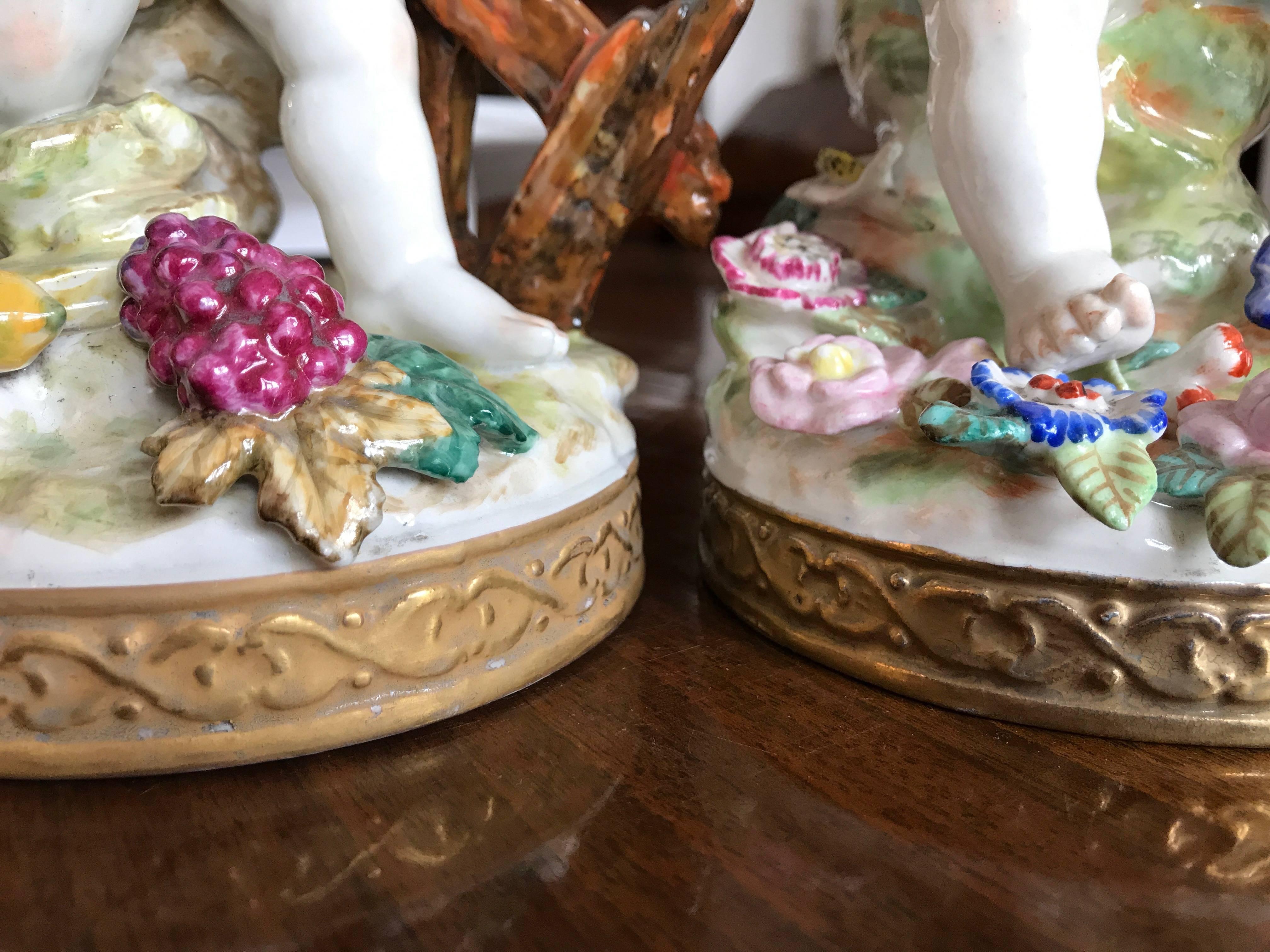 20th Century Putti European Pair of Porcelain Cherubs For Sale at 1stDibs