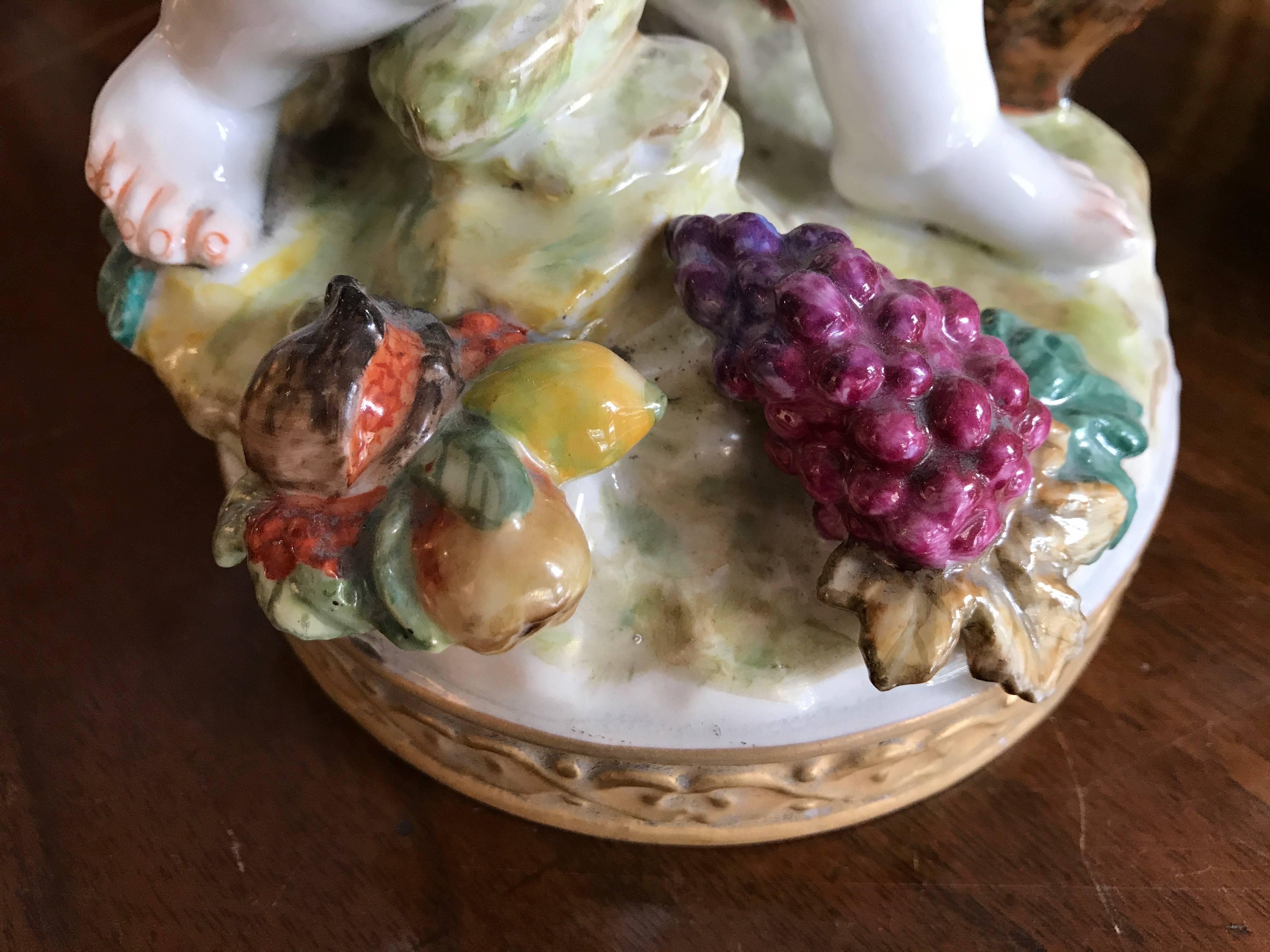 20th Century Putti European Pair of Porcelain Cherubs For Sale at 1stDibs