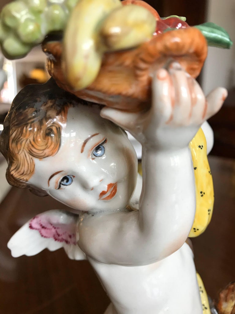 20th Century Putti European Pair of Porcelain Cherubs For Sale at 1stDibs