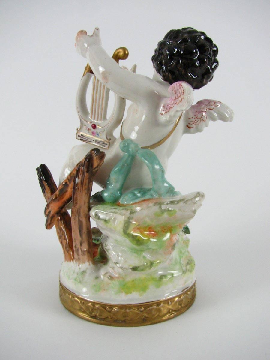 20th Century Putti European Pair of Porcelain Cherubs For Sale at 1stDibs
