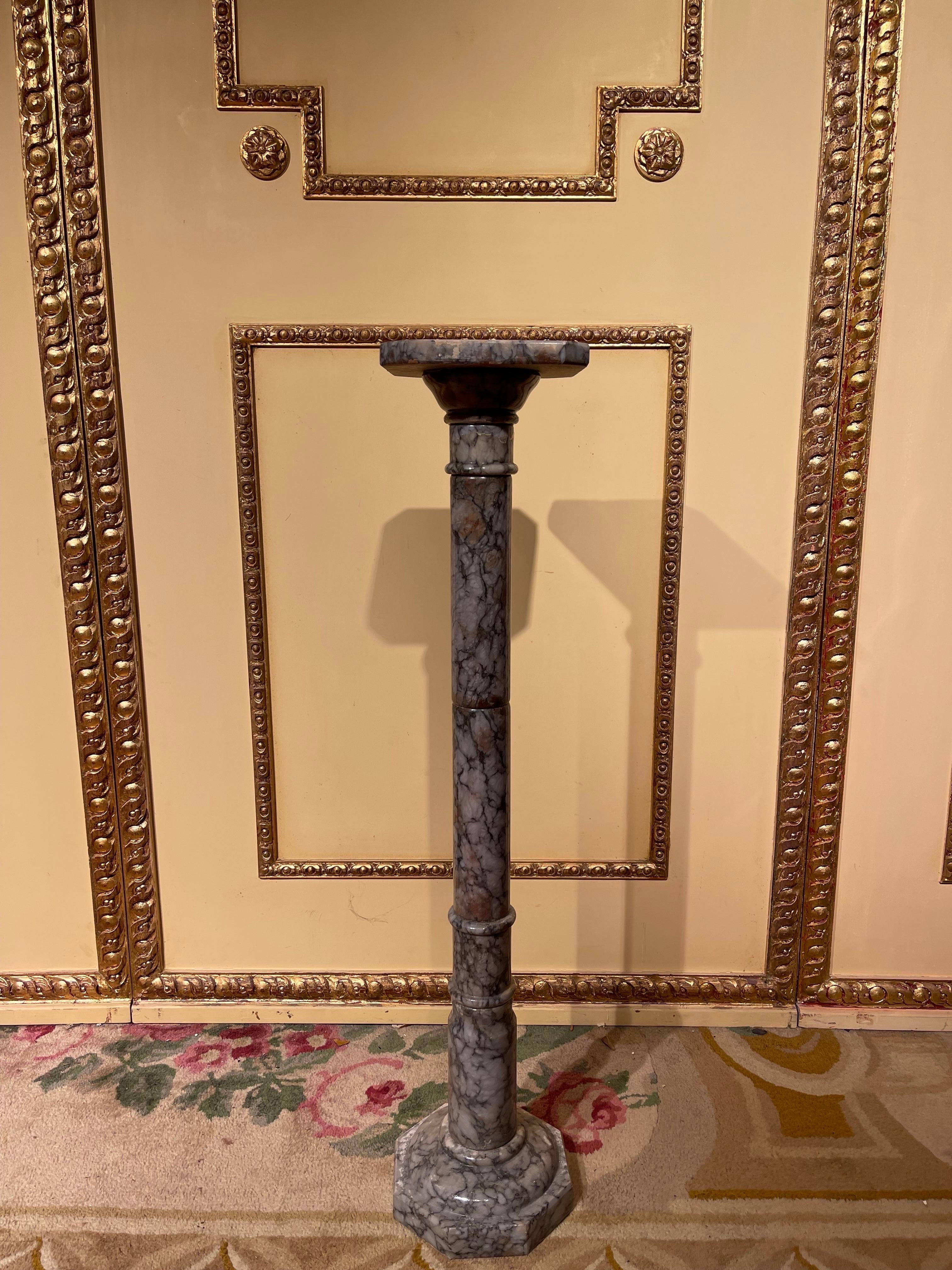 20th century quality marble pillar / column in neoclassical style

Square plinth with balustrade pillar base. Far protruding, stepped square cover plate.