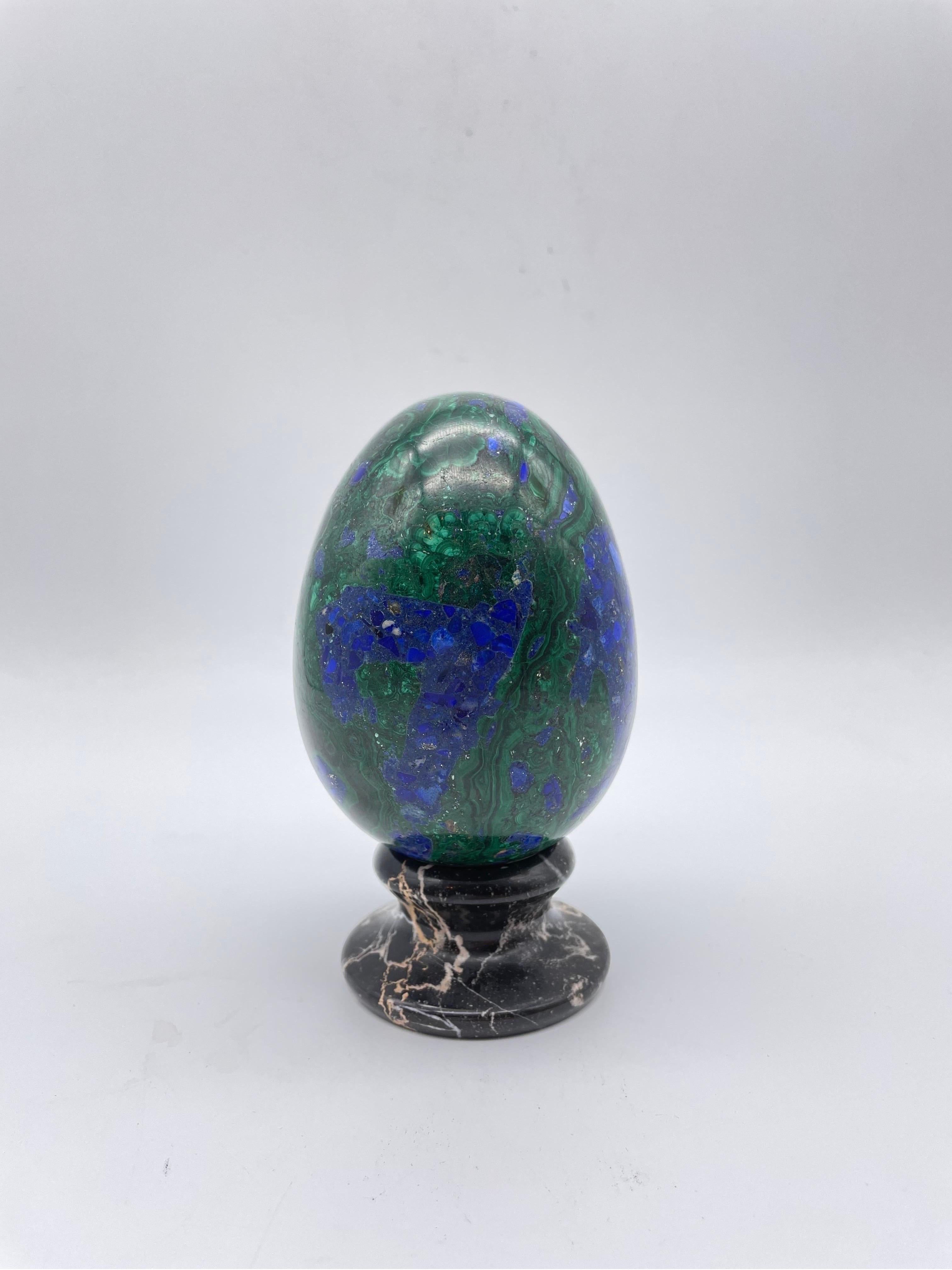 20th century rare Azurite Mineral egg on marble base

Unique egg-shaped azurite mineral on a marble base. Gorgeous color scheme. It is ideal as a table/desk decoration.

Azurite, also known under its mining name mountain blue, copper blue or