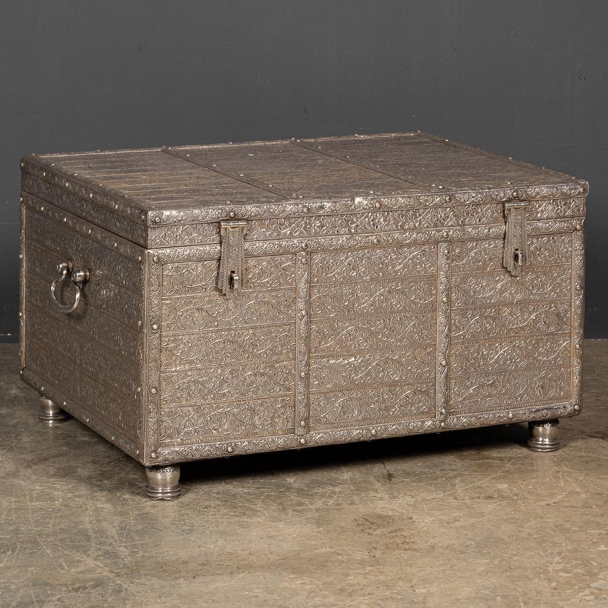 Antique 19th Century rare Indian Solid Silver treasure chest / casket, massive size, of rectangular form with hinged lid, foliate lock and hinged handles, profusely repousse' decorated with scrolling foliage throughout on a matted ground, the