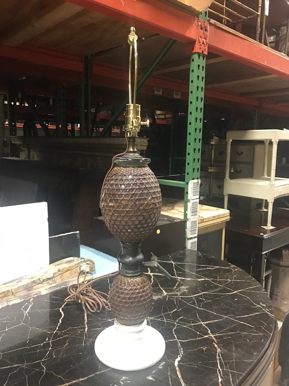 20th Century Rattan Covered Glass Seltzer Bottle as Lamp, White Ceramic Base In Good Condition For Sale In Atlanta, GA