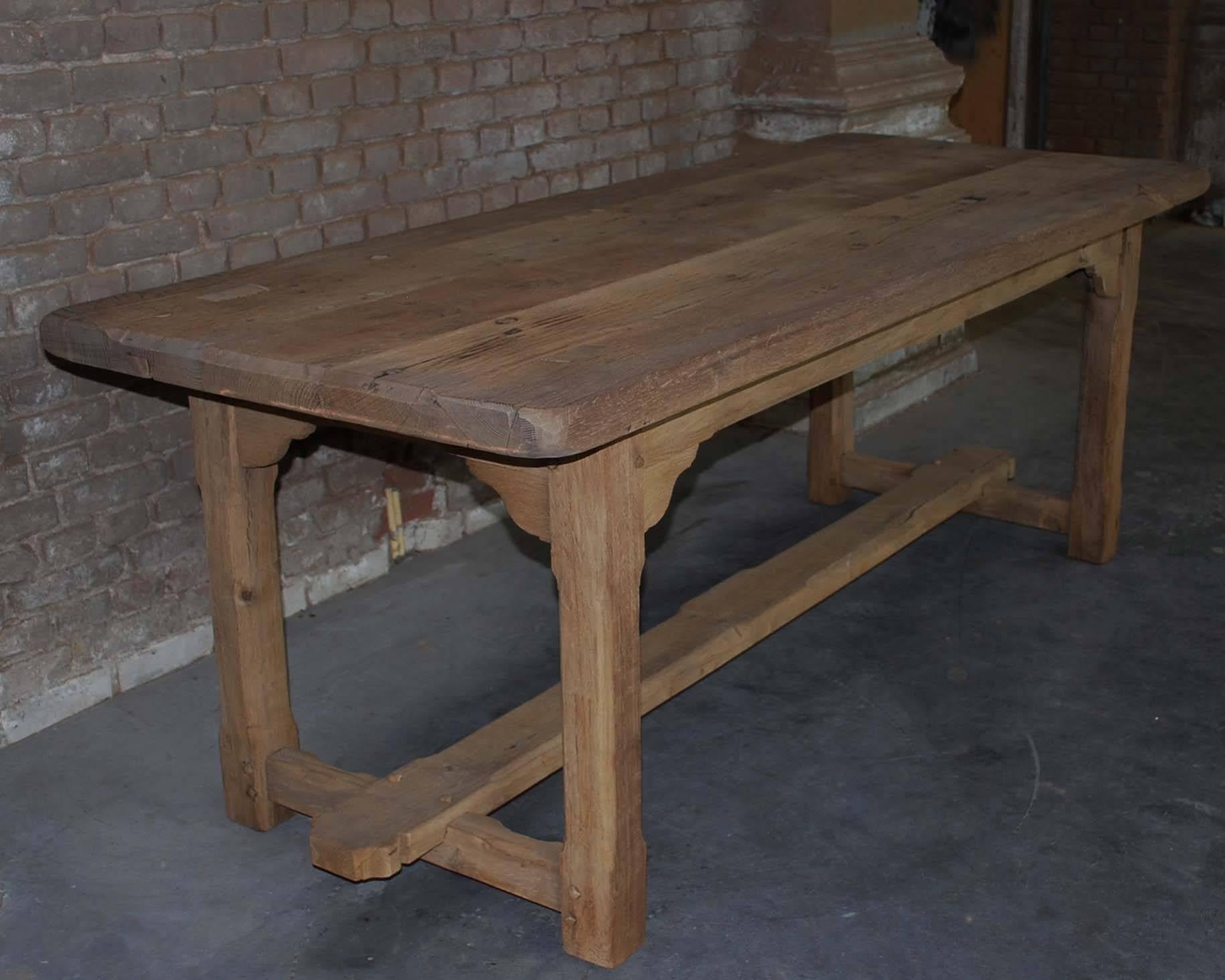 This dining table is made from reclaimed oak beams.
It was made during the 1960s in Veldhoven (the Netherlands) by Piet Rombouts & Sons. They were well-known in the Netherlands for both their antique as well as their new furniture made from