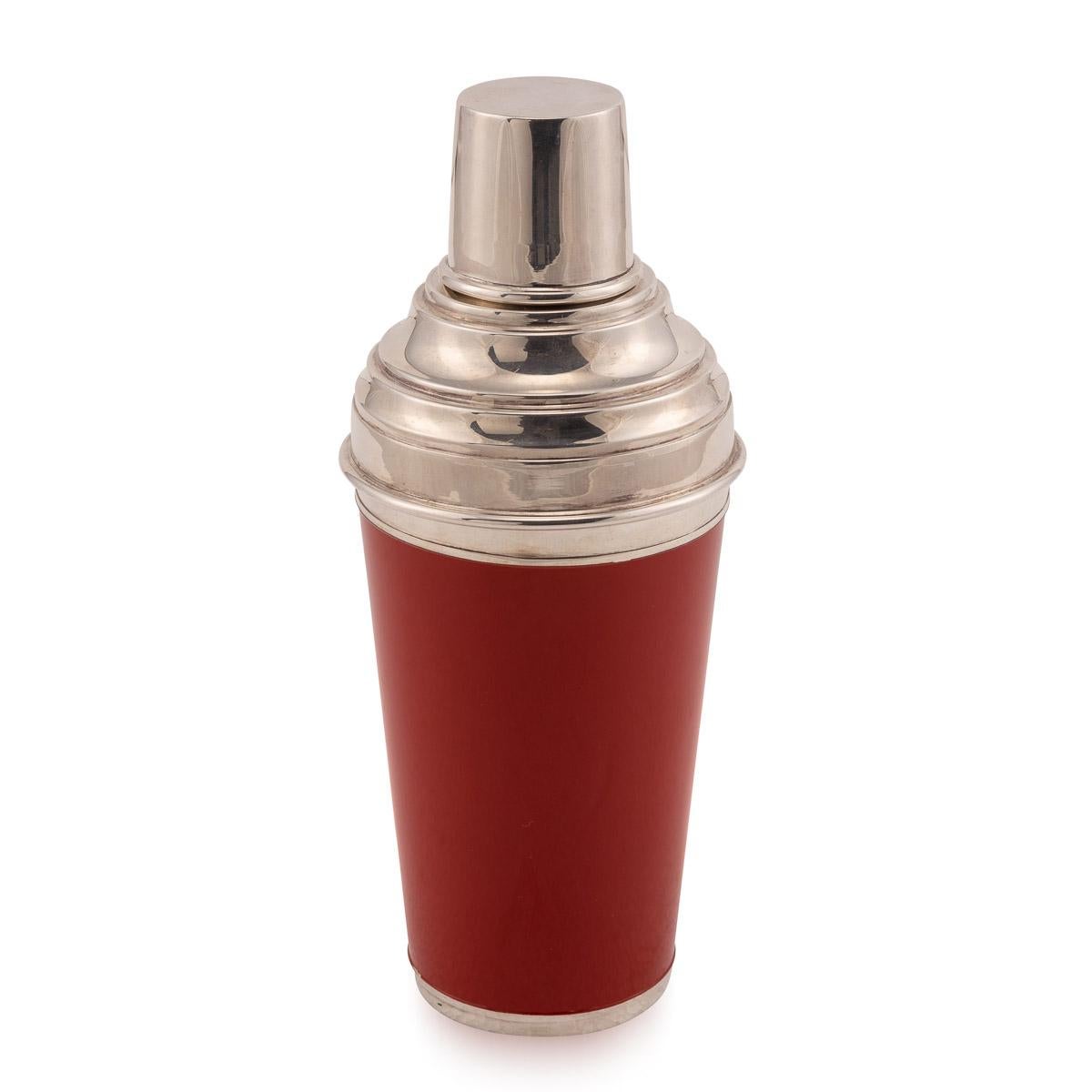 A lovely cocktail shaker retailed by Asprey’ of London, England. Superb quality, red enameled body, and in excellent condition. Unused, even comes with its original velvet pouch, it is a fabulous piece of barware that makes for an excellent gift
