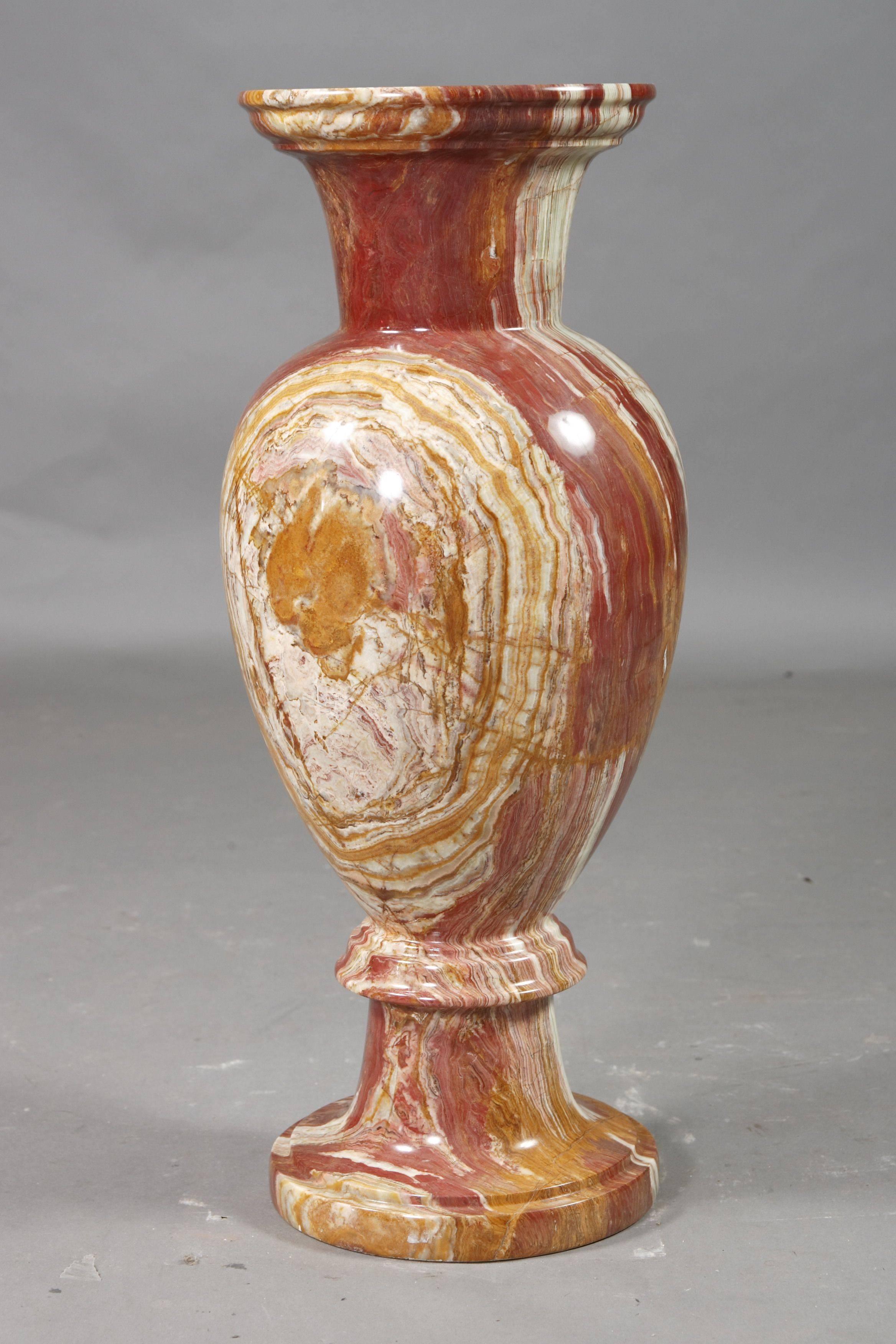 Delicate marble vase.
Natural marble in red Onyx. Graduated round feet, in sweeping shaft. Ovoid body, lightly ascending neck and wide, prominent convex edge. 

(U-Hai-20).