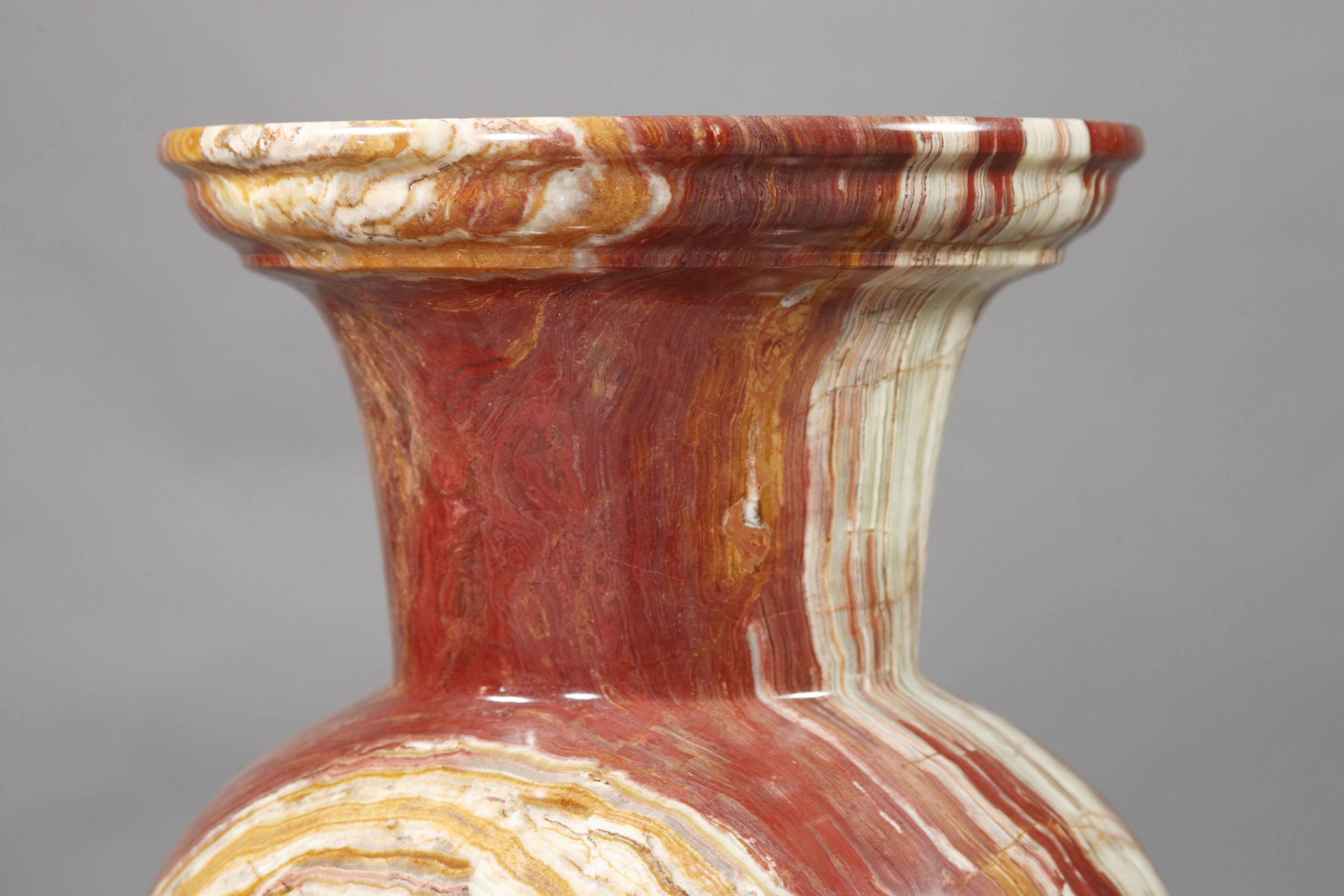 red marble vase