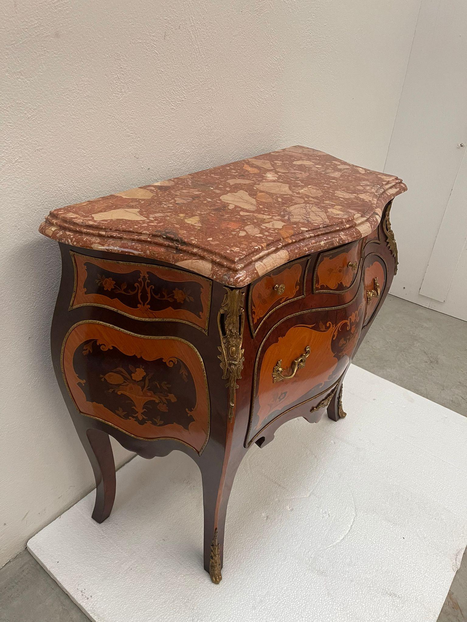 Unique piece of furniture made of fine carved wood with brass decorations. There are large drawers. A unique price, full of history and charm.

Designed by MiceVersailles.