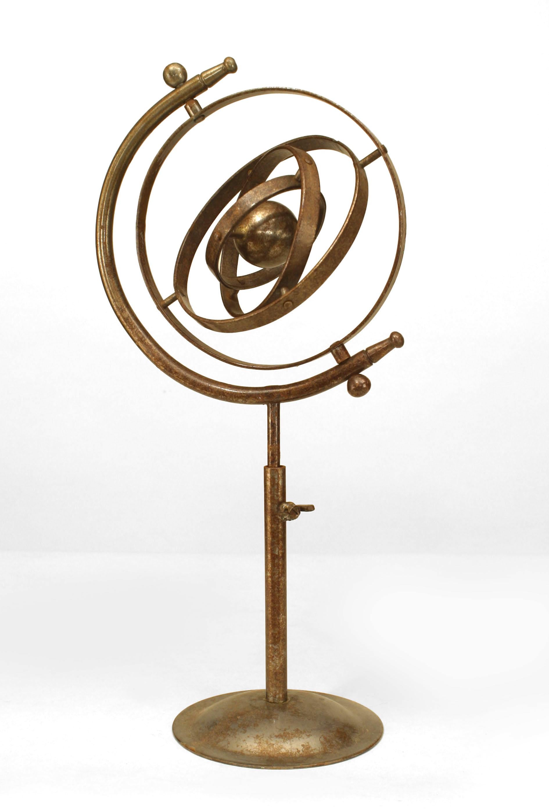 Italian Renaissance-style (20th Century) chrome armillary globe with a rust patina.
