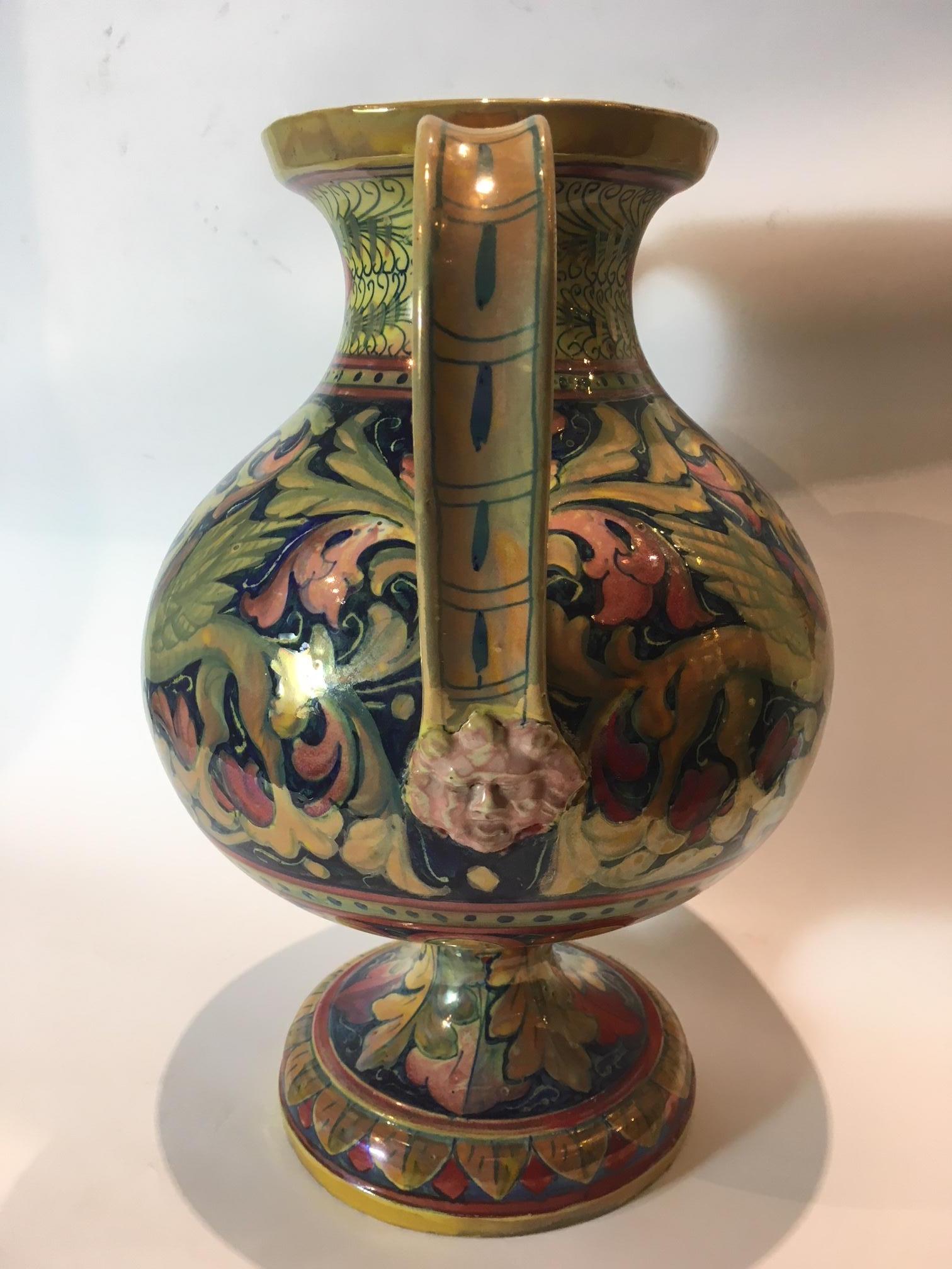 Stunning ceramic vase, Renaissance ornaments typical Gualdo Tadino manufacture, Central Italy town renowned for the Renaissance manufacture vases. Typical Amphora shape, large handles, it was used for holding water. Flower arrangements, dragons on