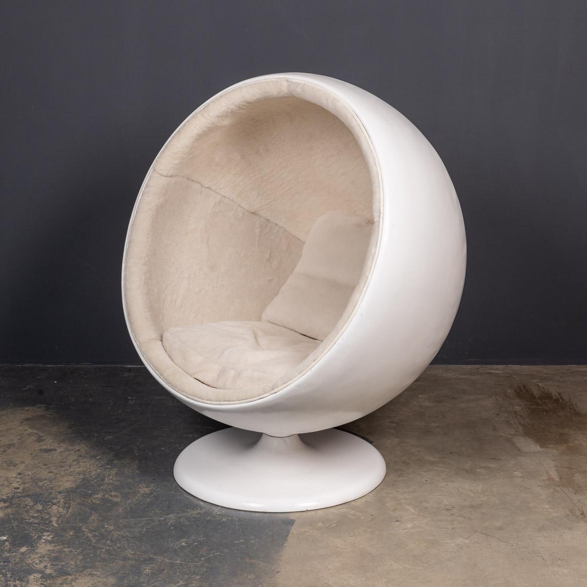 The iconic and original ball chair, designed by Eero Aarnio for Asko. The interior cushioning has been refurbished with lamb sheepskin. The Ball Chair was designed by Finnish furniture designer Eero Aarnio in 1963. The Ball Chair is also known as