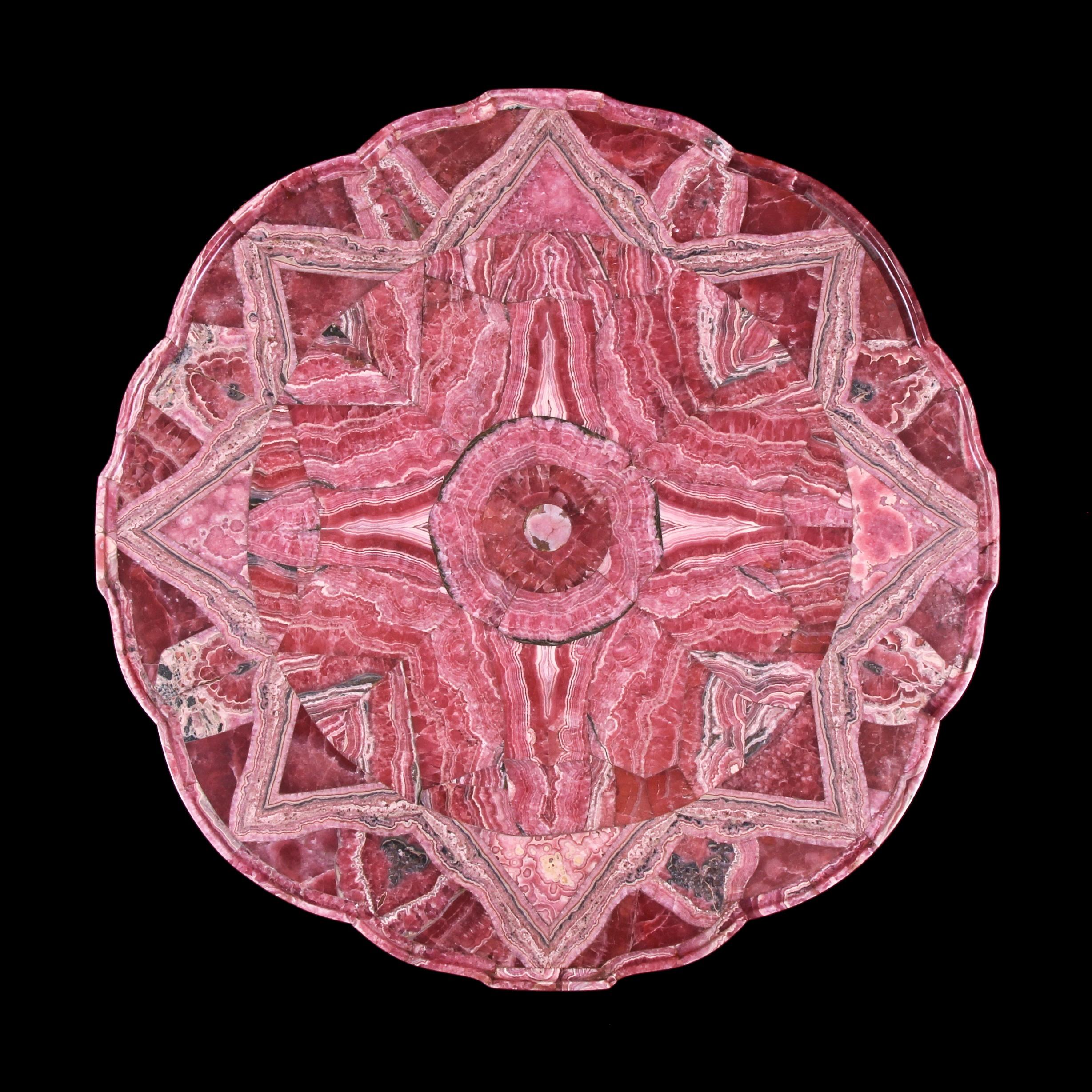 A highly prized gemstone masterpiece of Museum quality and incredible rarity. 

Spectacular & Highly Important Early 20th Century Rhodochrosite Gemstone Plateau / Table Top. Veneered to form an 8 point star design, Shaped with a moulded edge