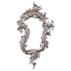 20. Jahrhundert, Silber-vergoldeter Wandspiegel im Rokoko-Stil